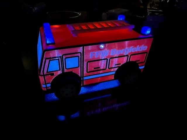 Fire Truck Lantern for St. Martin's Day - Multicolor Stained-Glass Look, LED, Rolling Wheels (DE/EN)