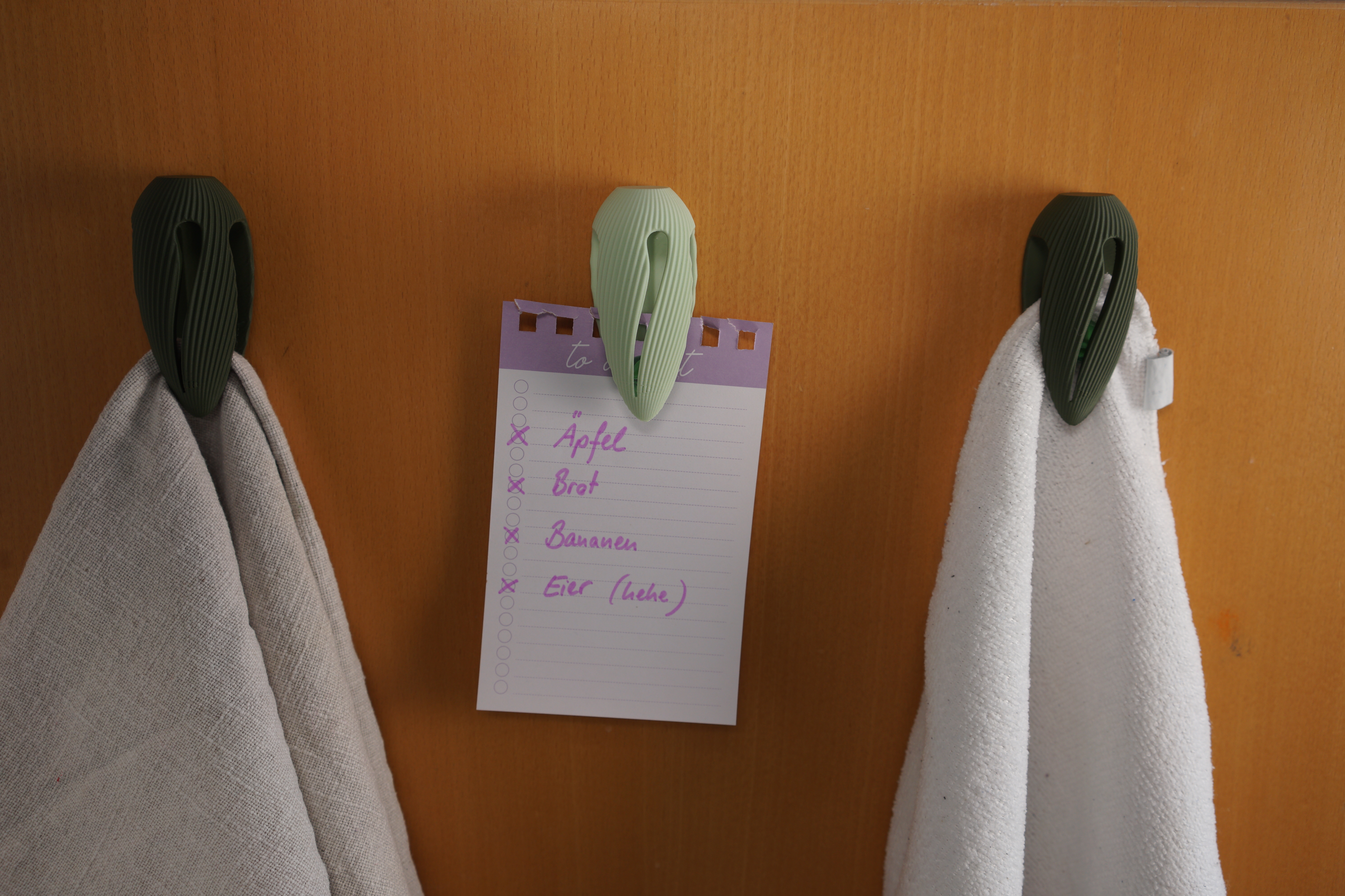 Gravity Marble Hook for kitchen towels, pictures or postcards