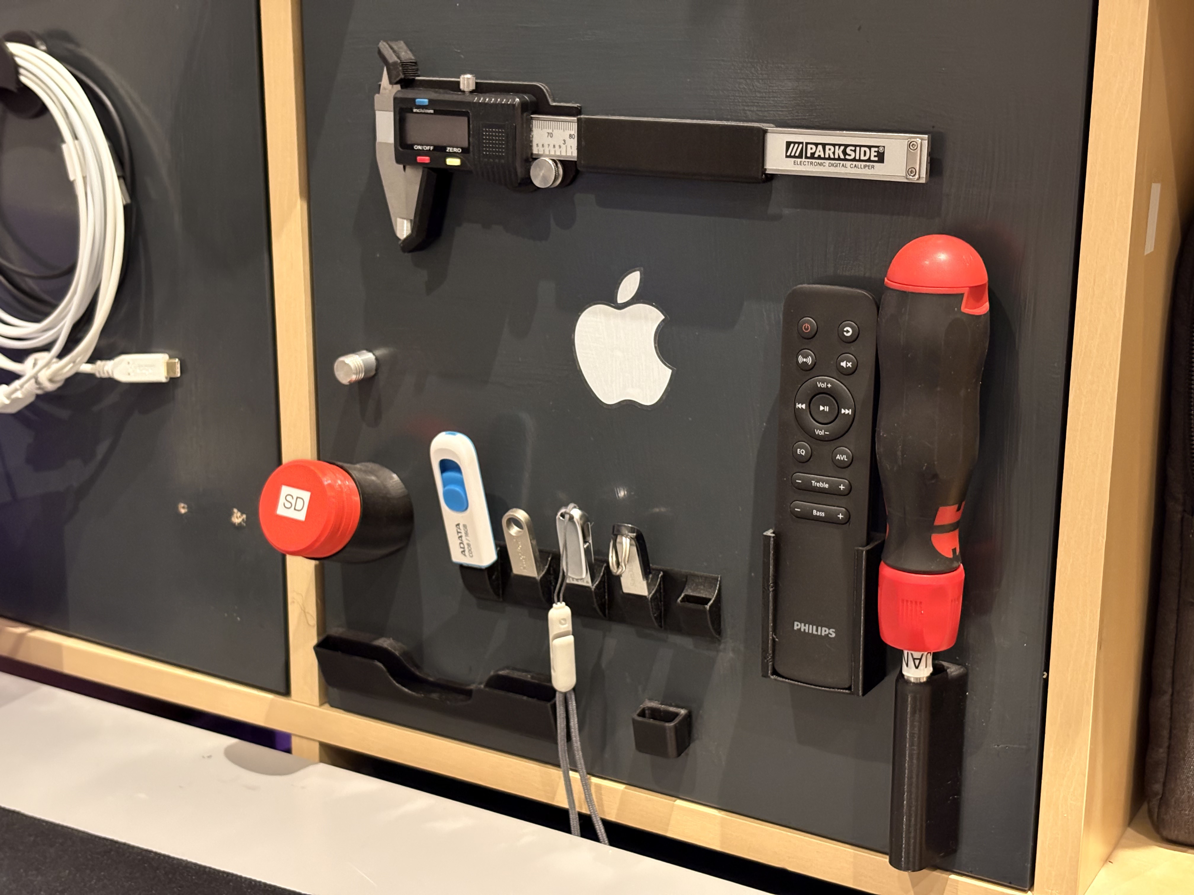 Caliper, USB, SD cards, screwdriver, Mac adapter holder