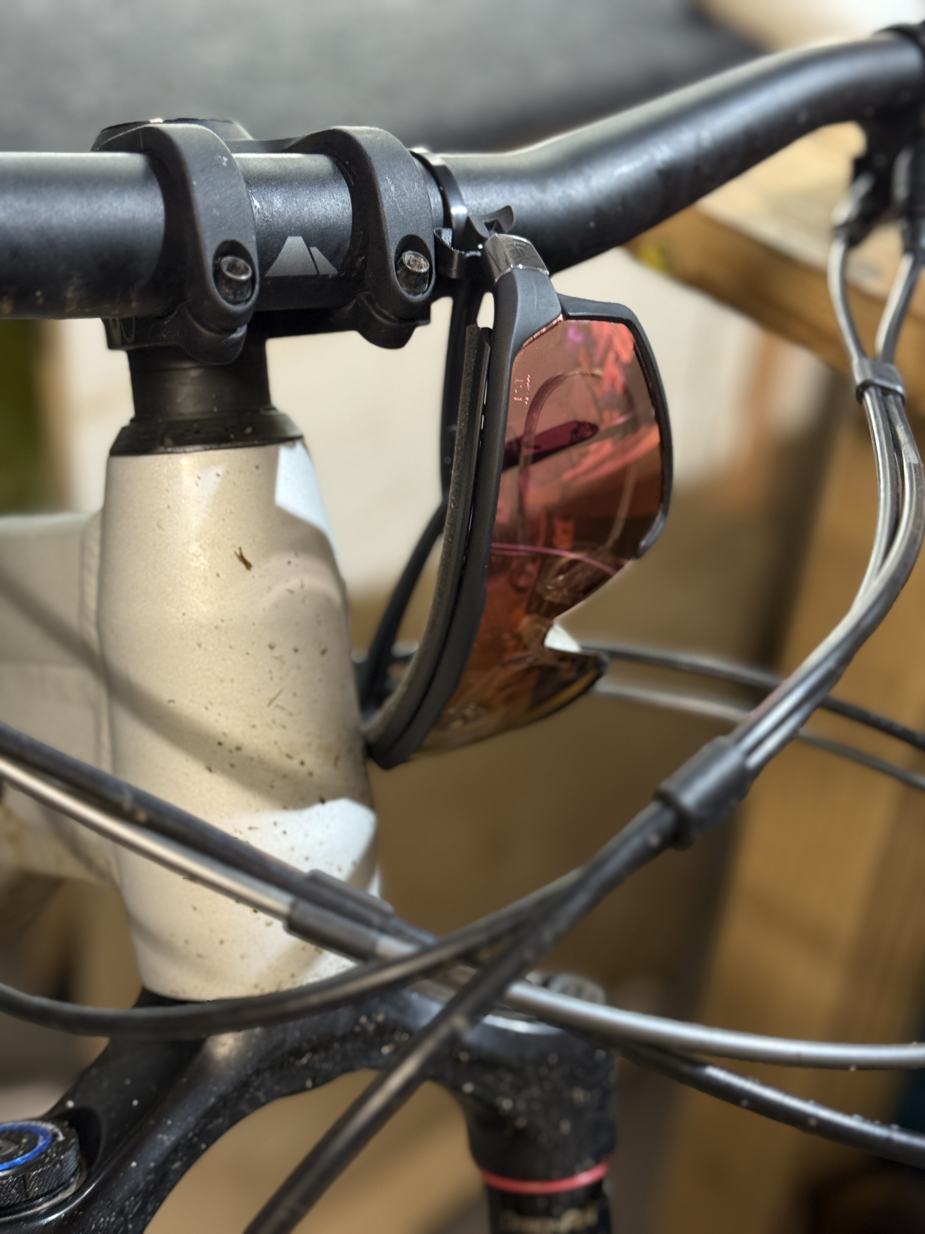 Glasses hanger for bike handlebar