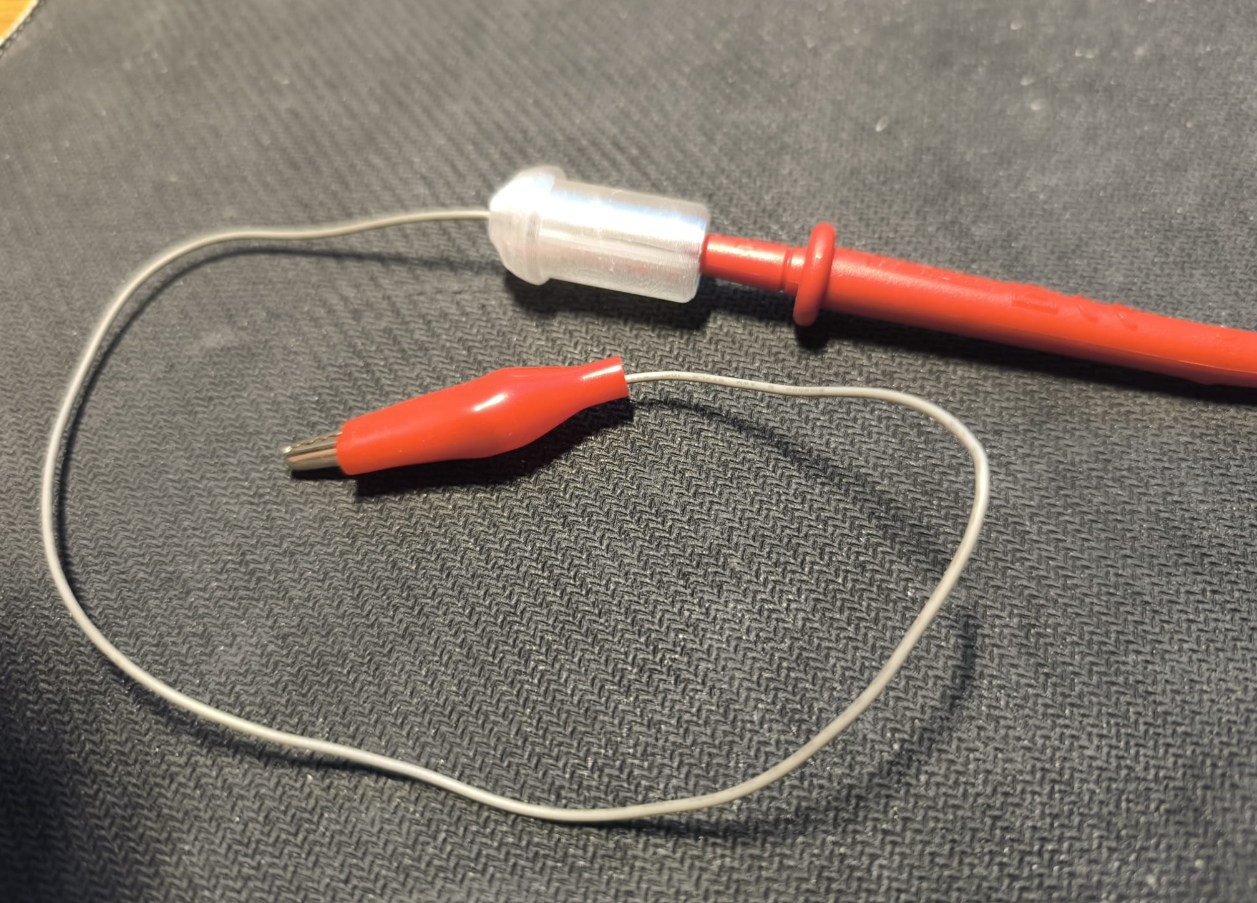 Voltmeter to alligator clip adapter. 3D model