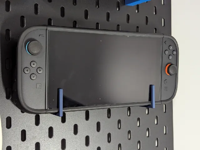 Skadis Hook for Switch 2 with a DBrand case