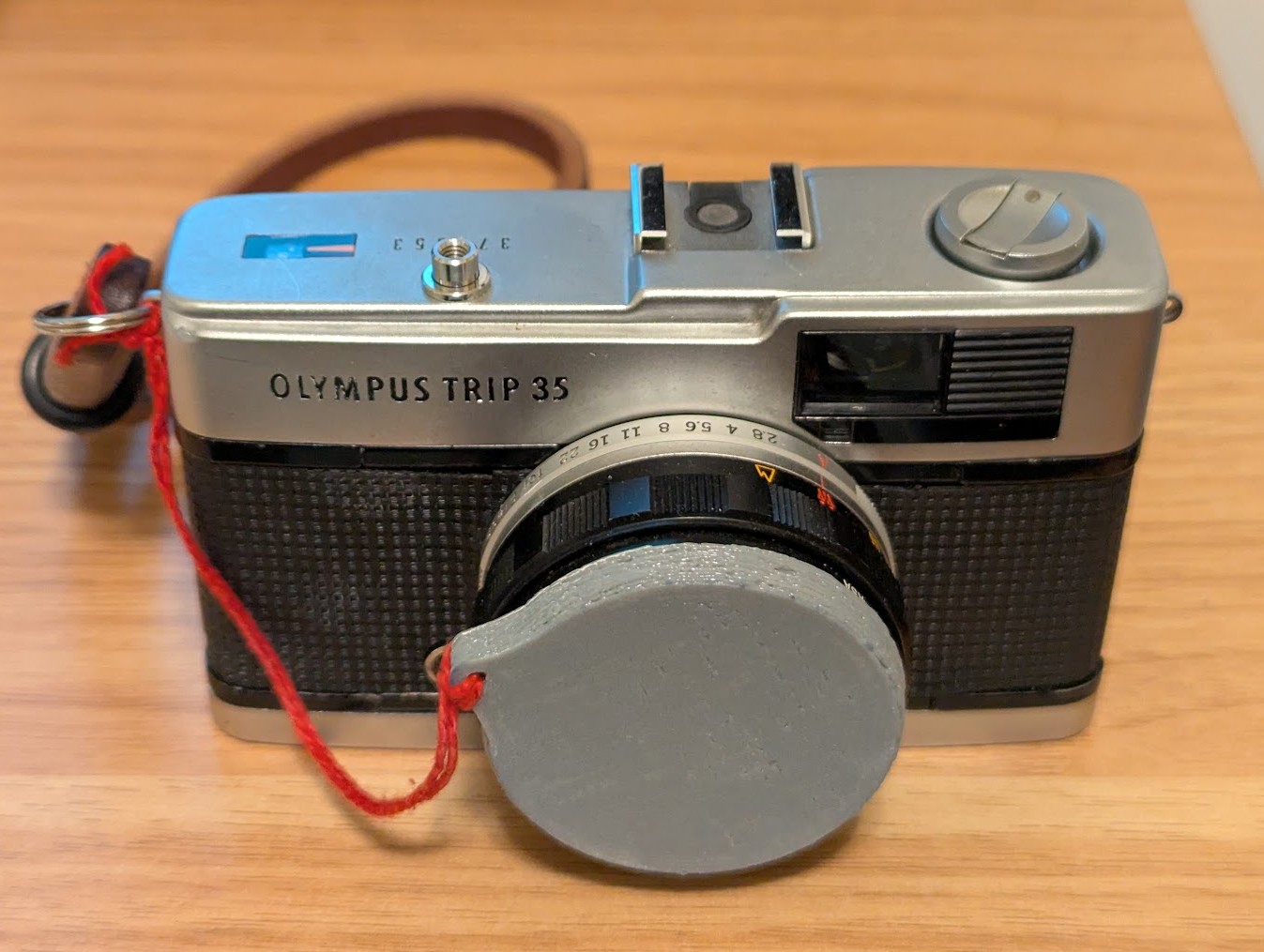 Olympus Trip 35 lens cover cap with leash