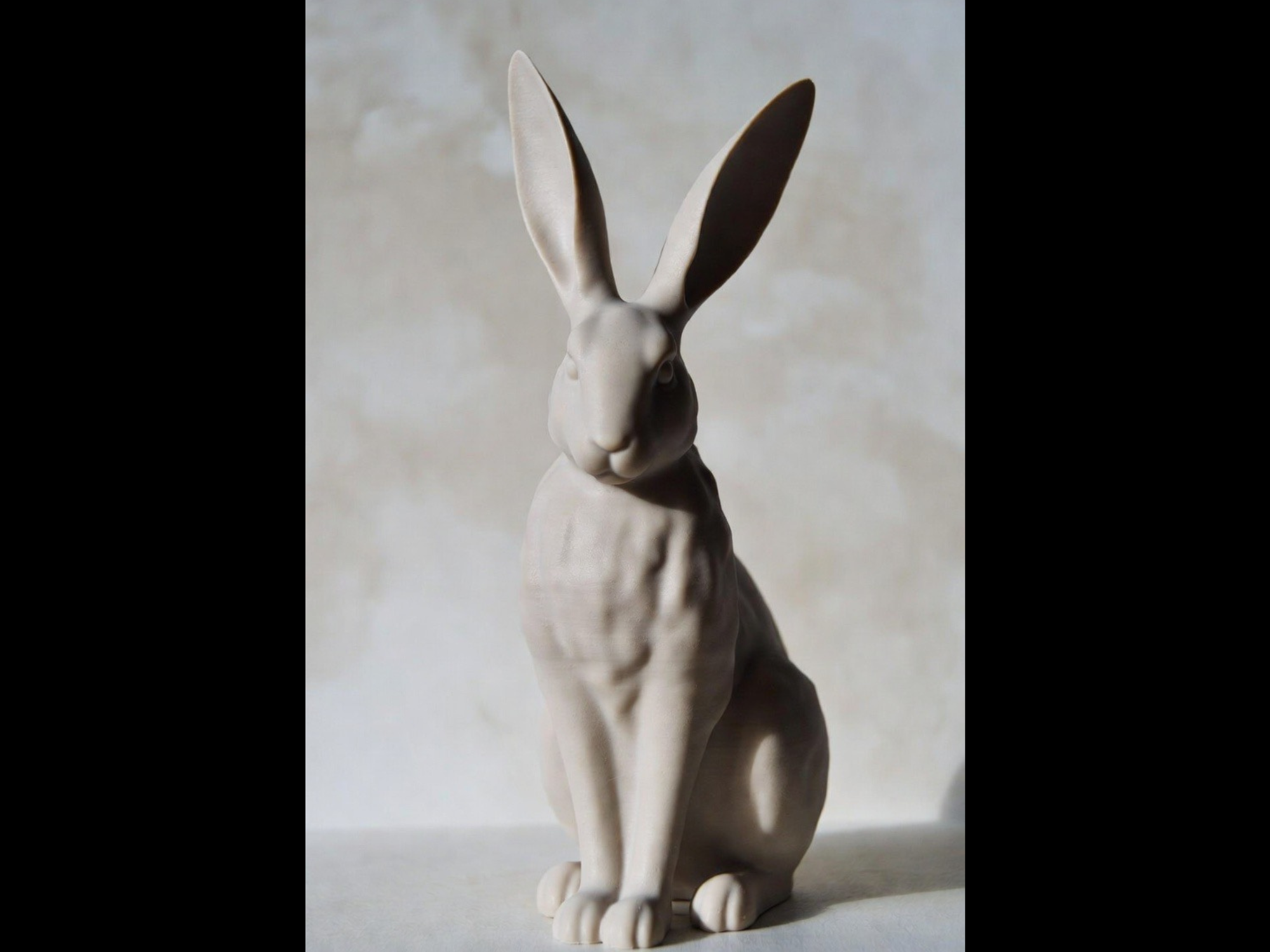 Sleek Bunny Figure