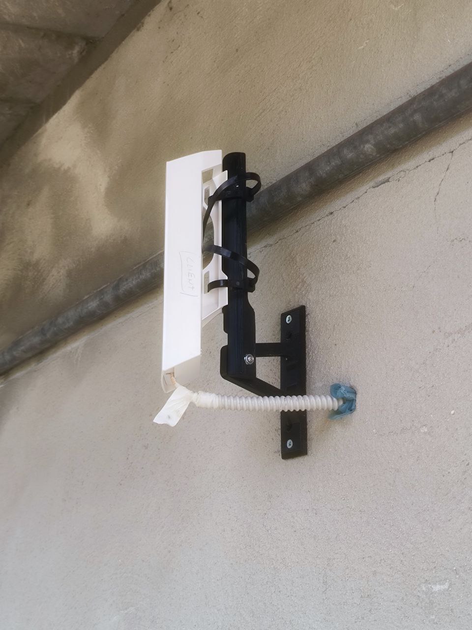 Universal Wall Mount Adapter for Pole-Mount Devices