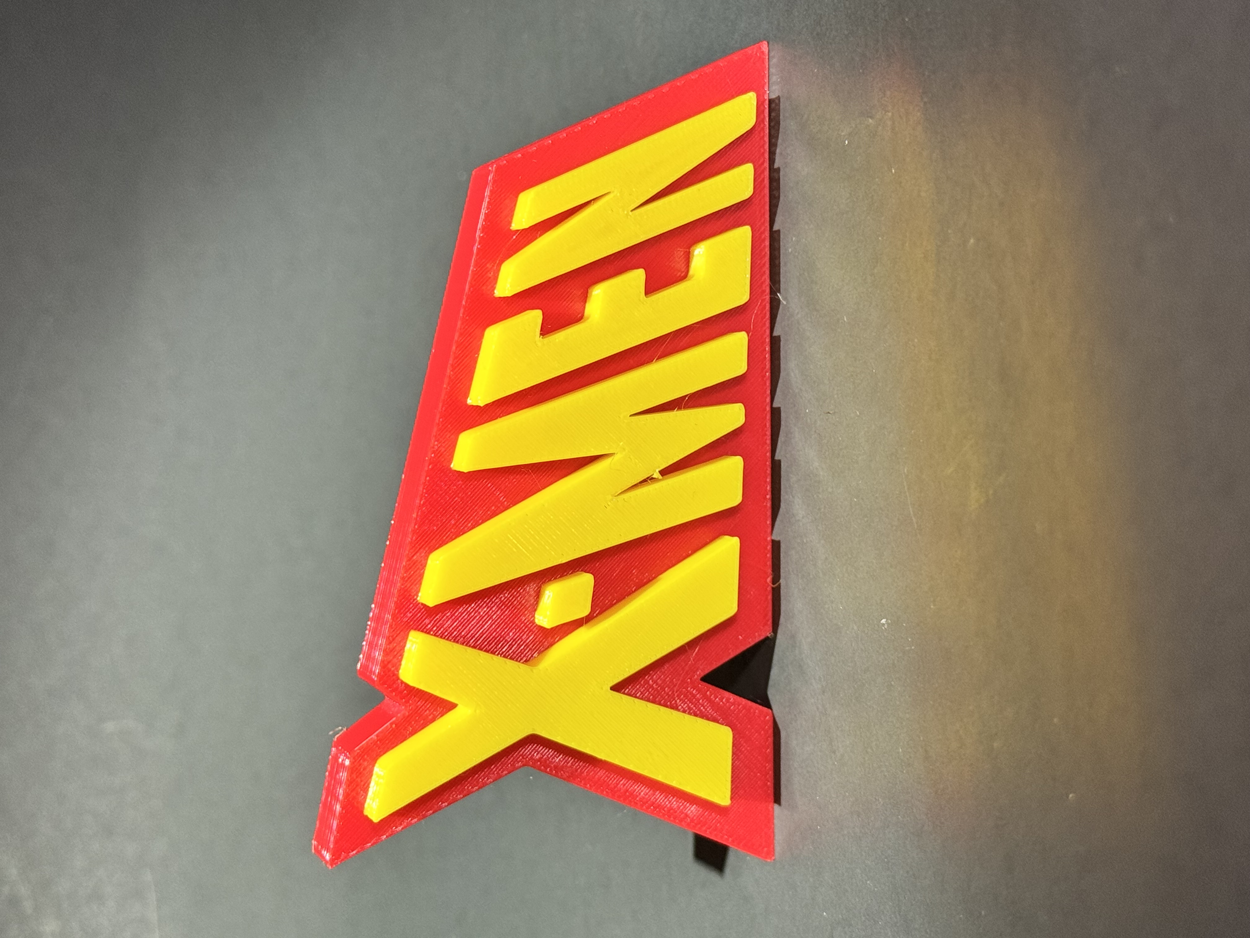 X-Men collectors logo plate