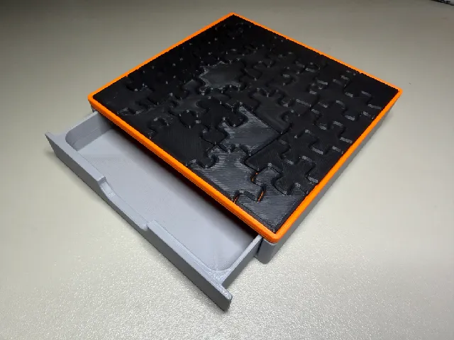 Puzzle with storage drawer