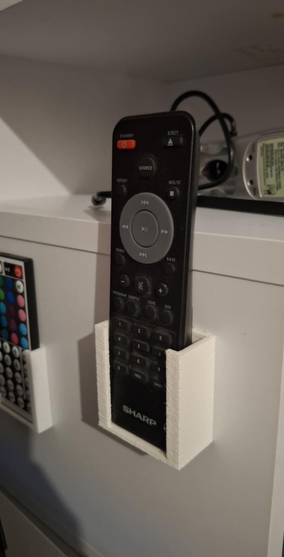 sharp remote controller holder