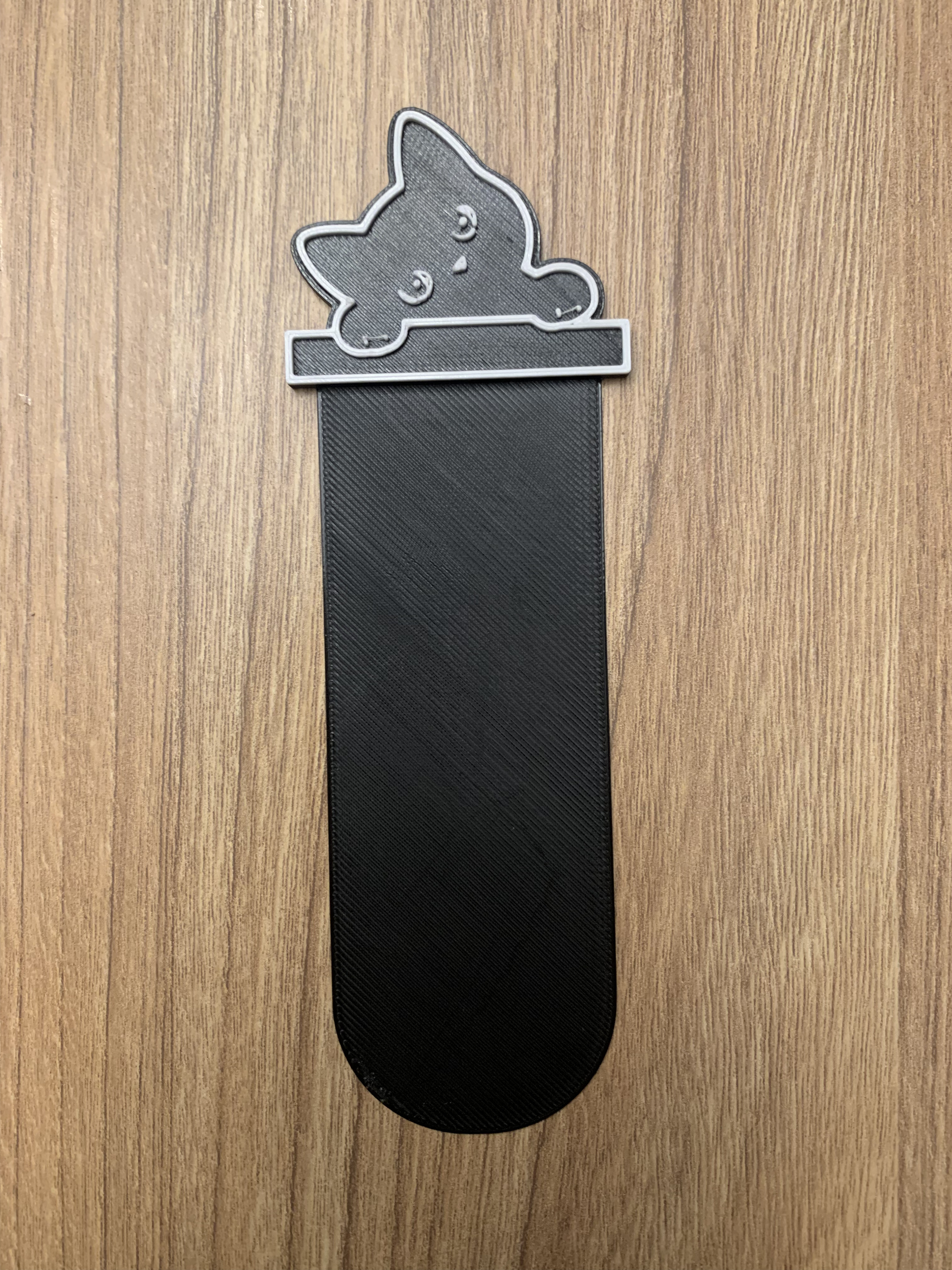 Cute Cat Peaking Over Bookmark