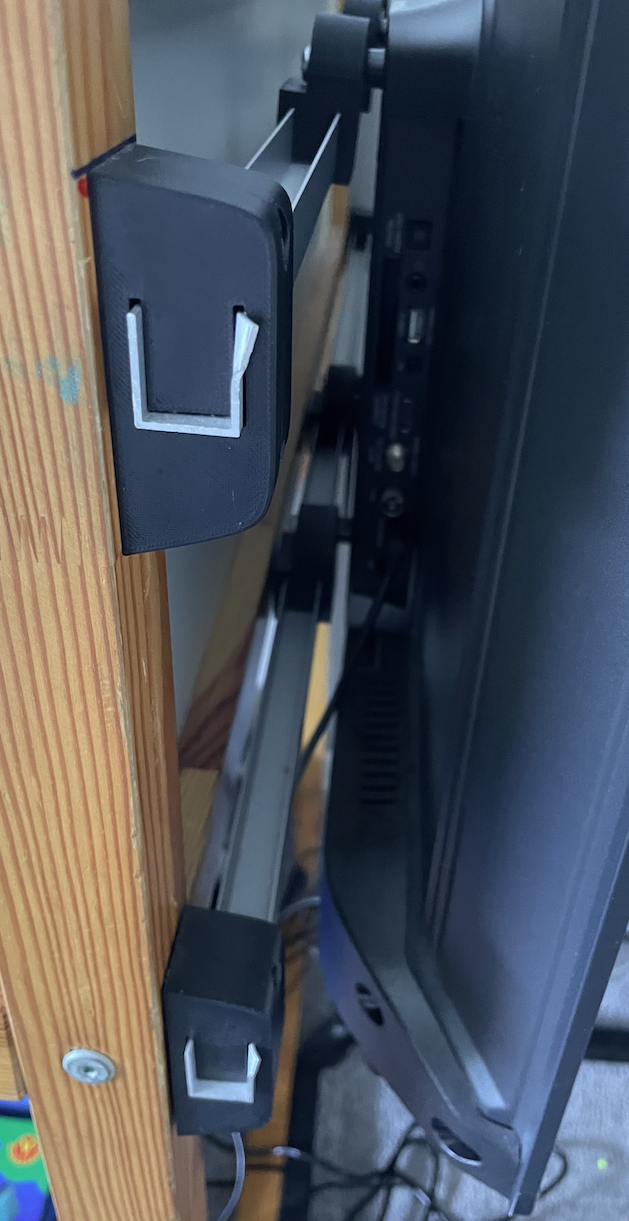 Ultra-simple TV mount made from two aluminum profiles.