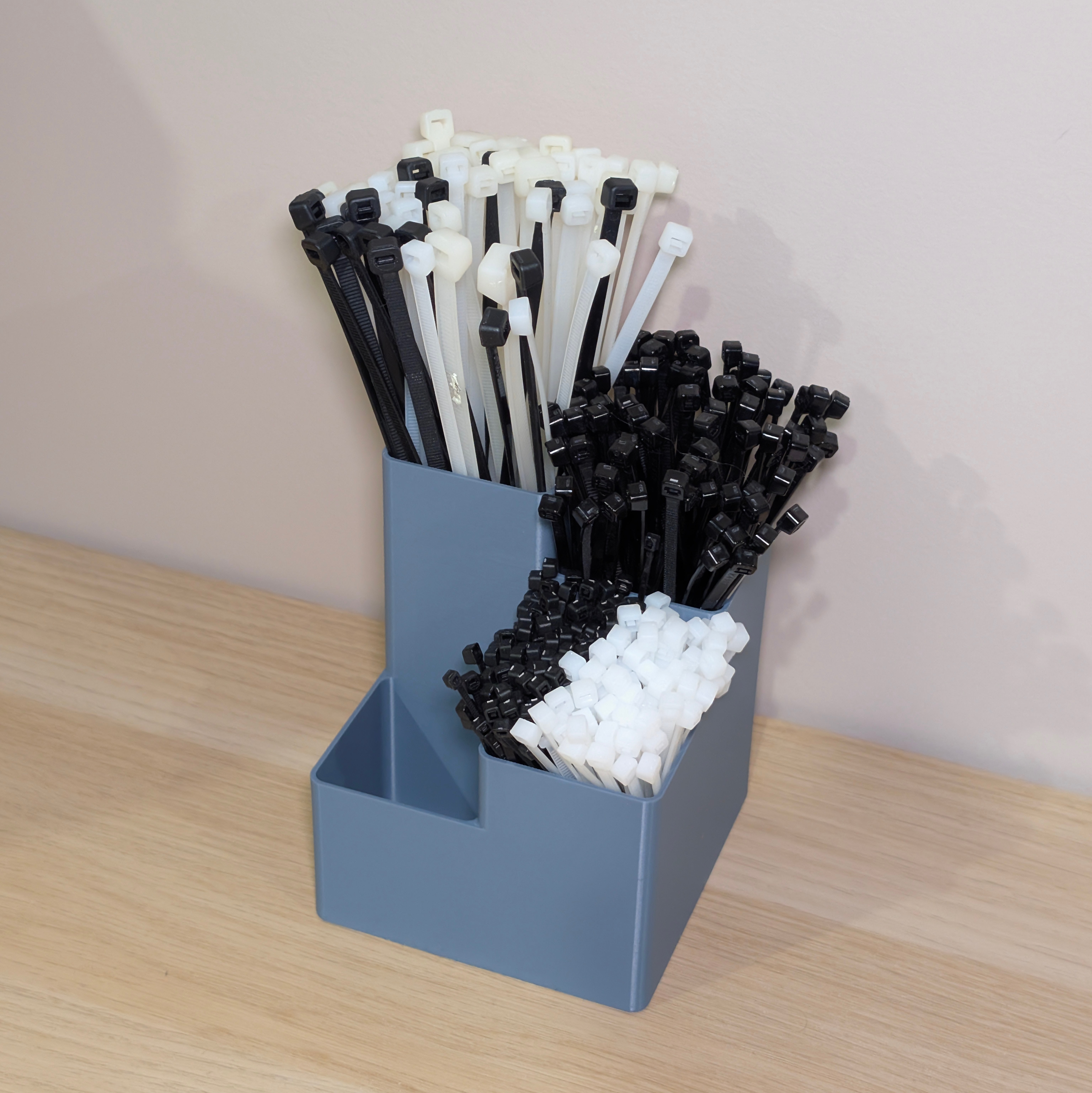 Tiered cable tie/tool/pen/pencil organiser
