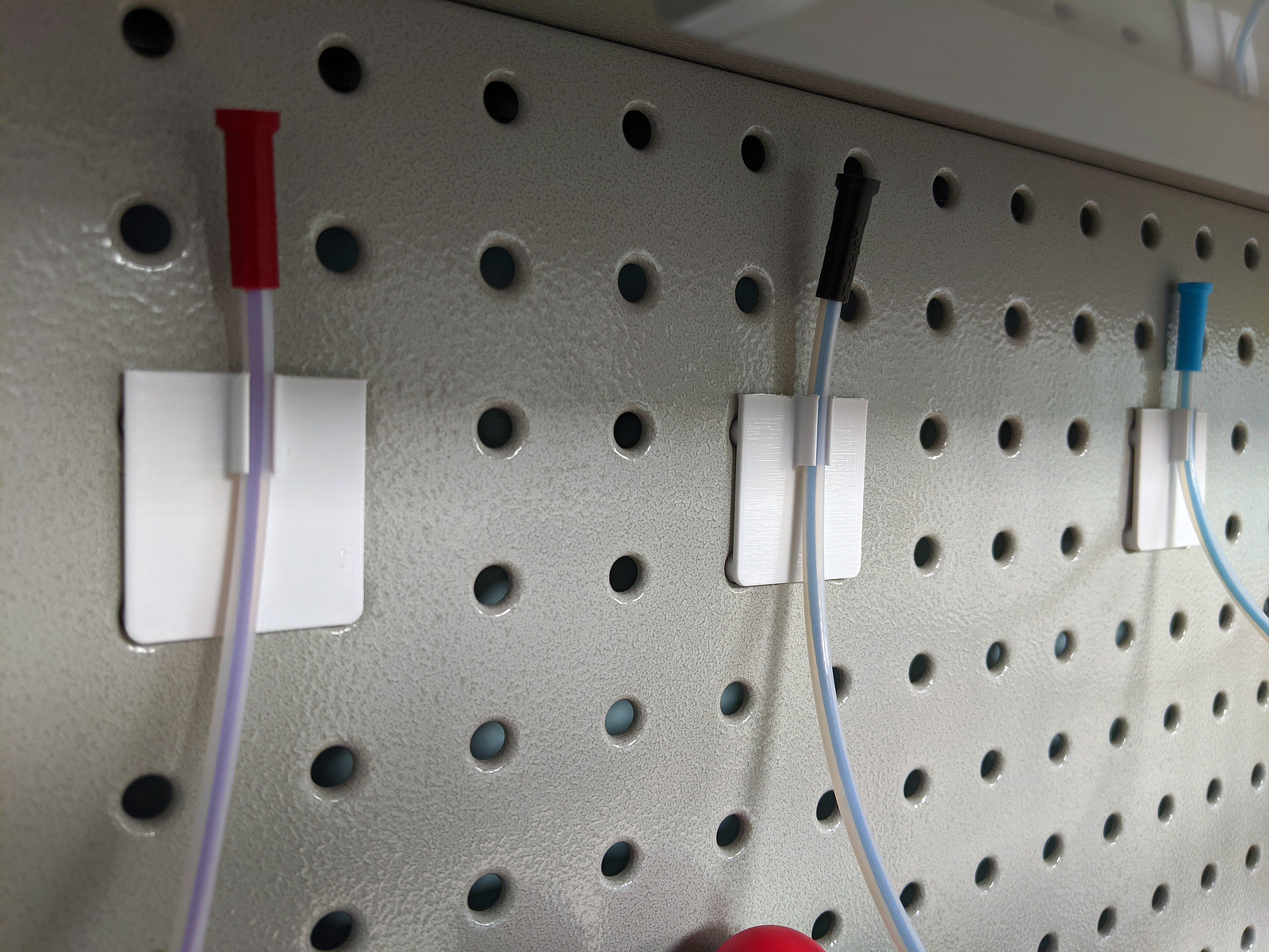 Pegboard PTFE holder