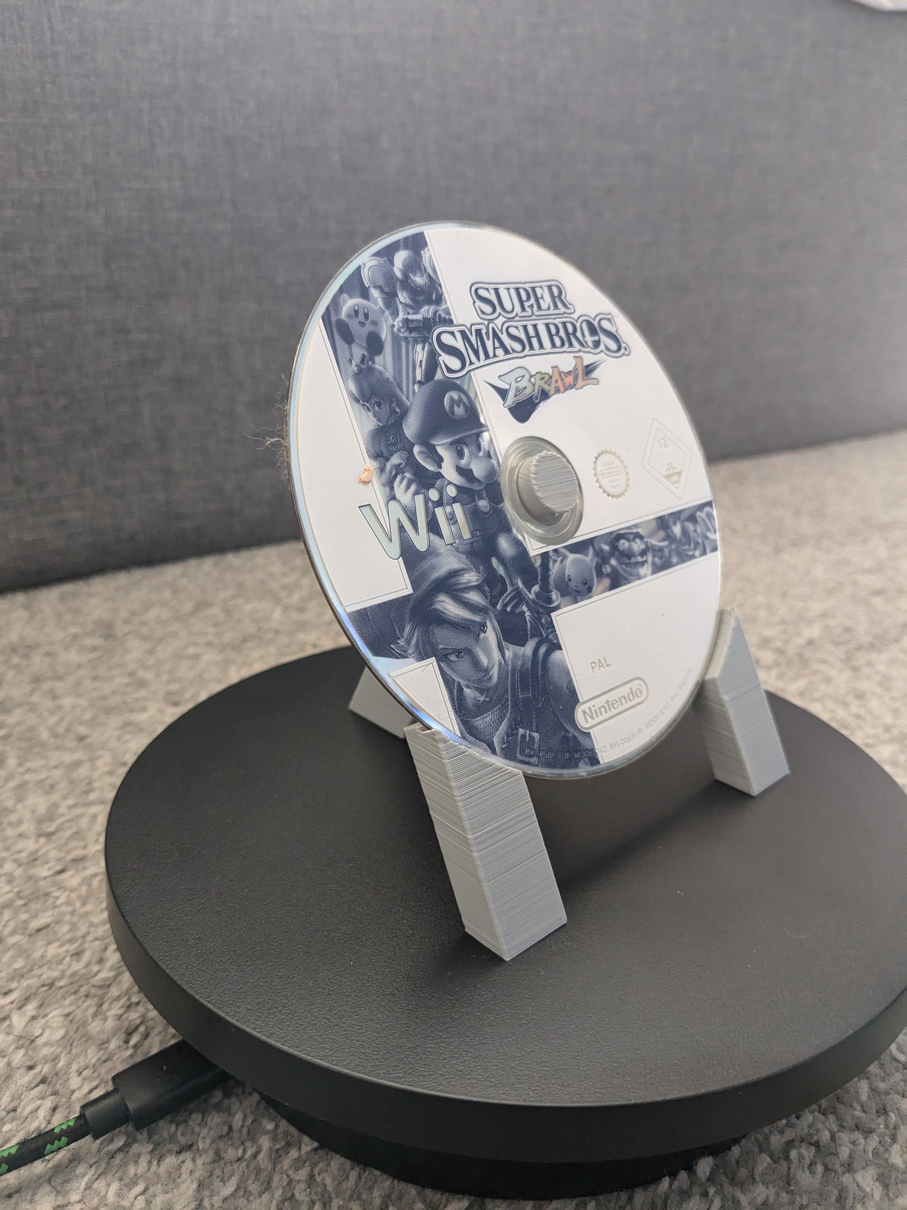 video game disk stand