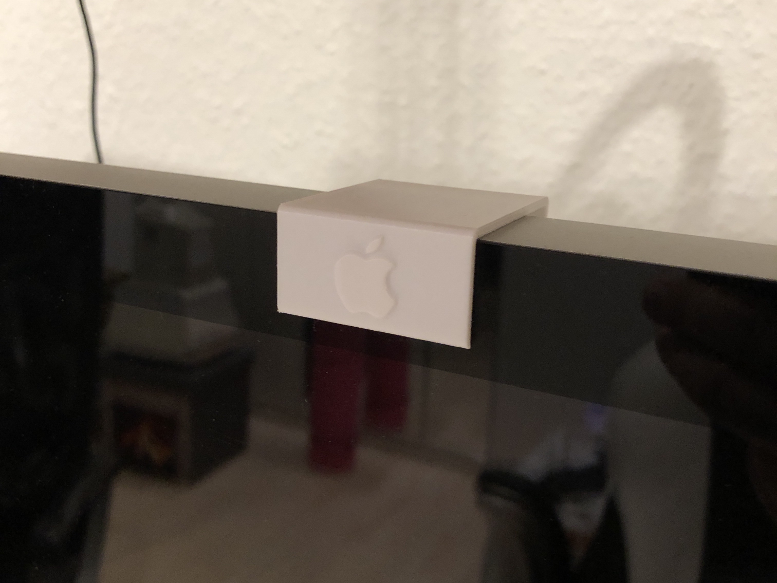 White iMac webcam cover