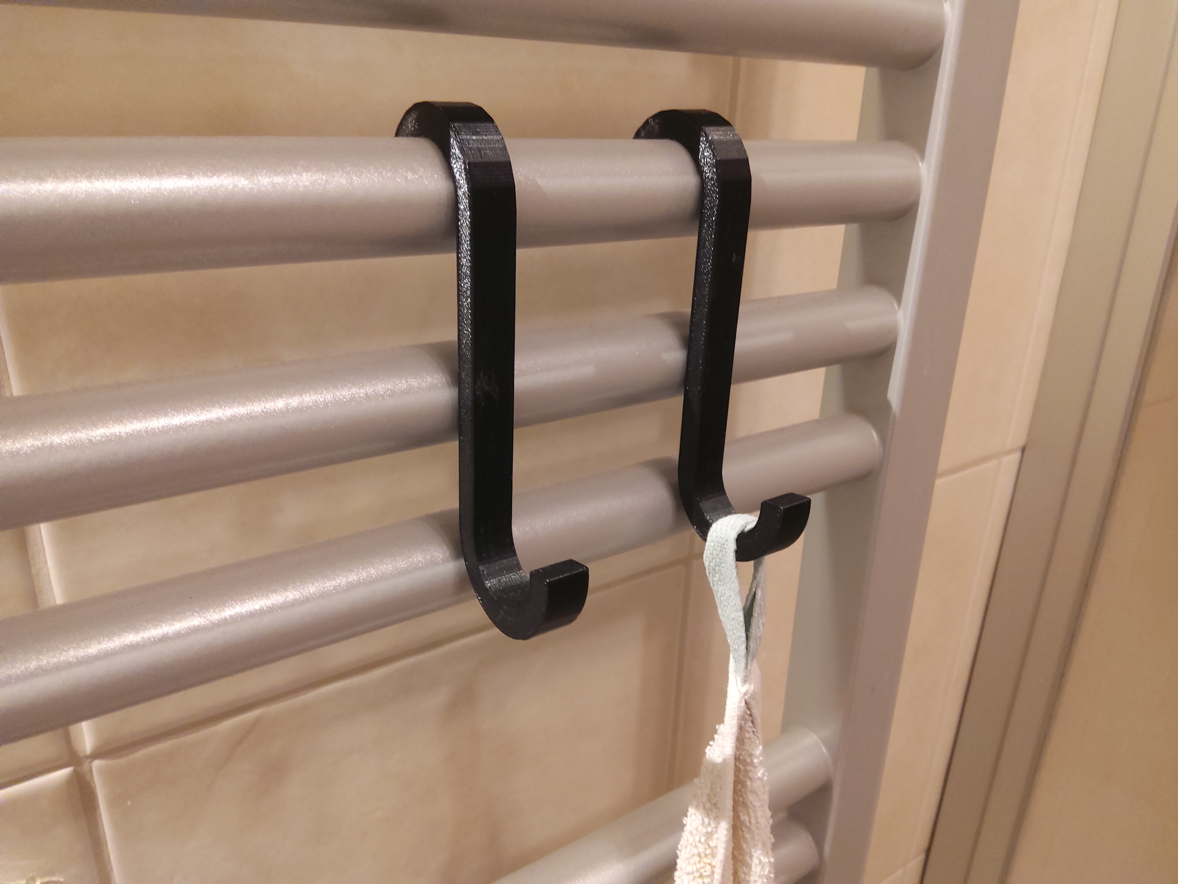 Simple towel hook for bath radiator