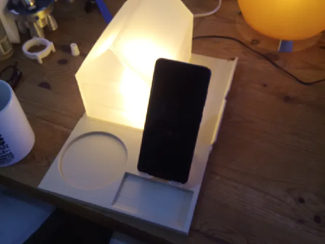 Bedside lamp and book rest remixed with added phone stand. Hue bulb compatible