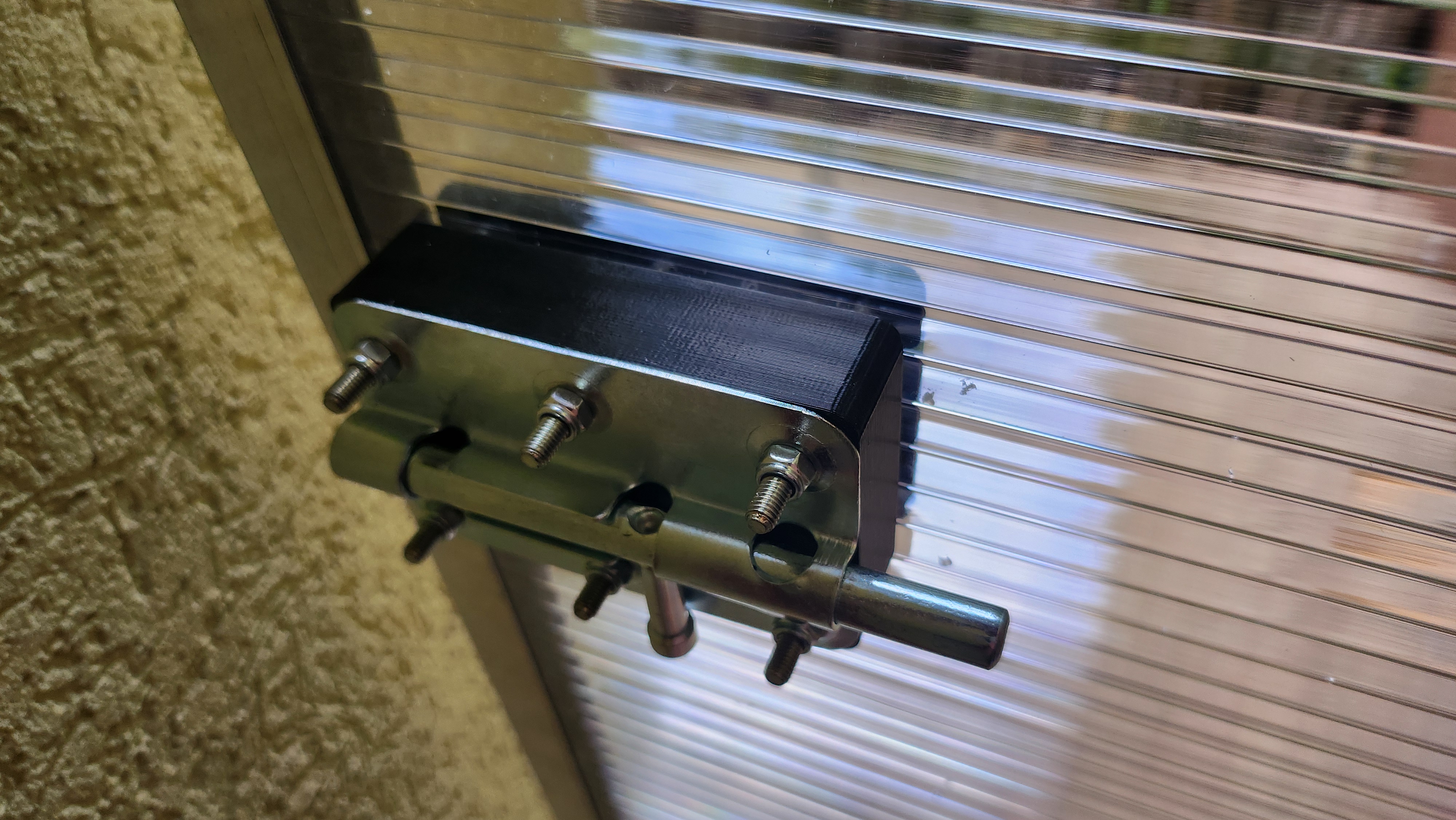 Sliding lock extension pad