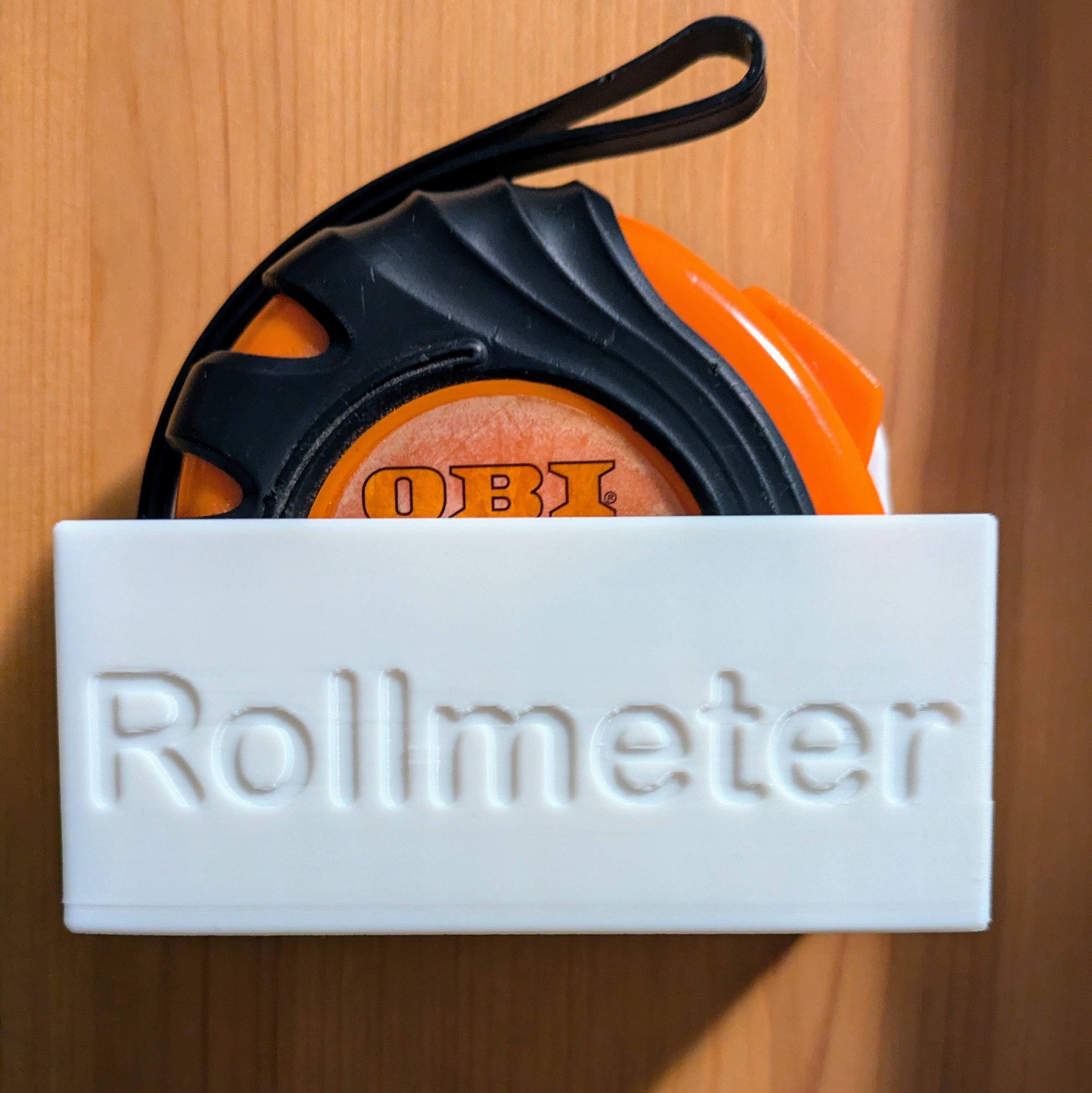 Wandhalterung für Rollmeter /  Maßband