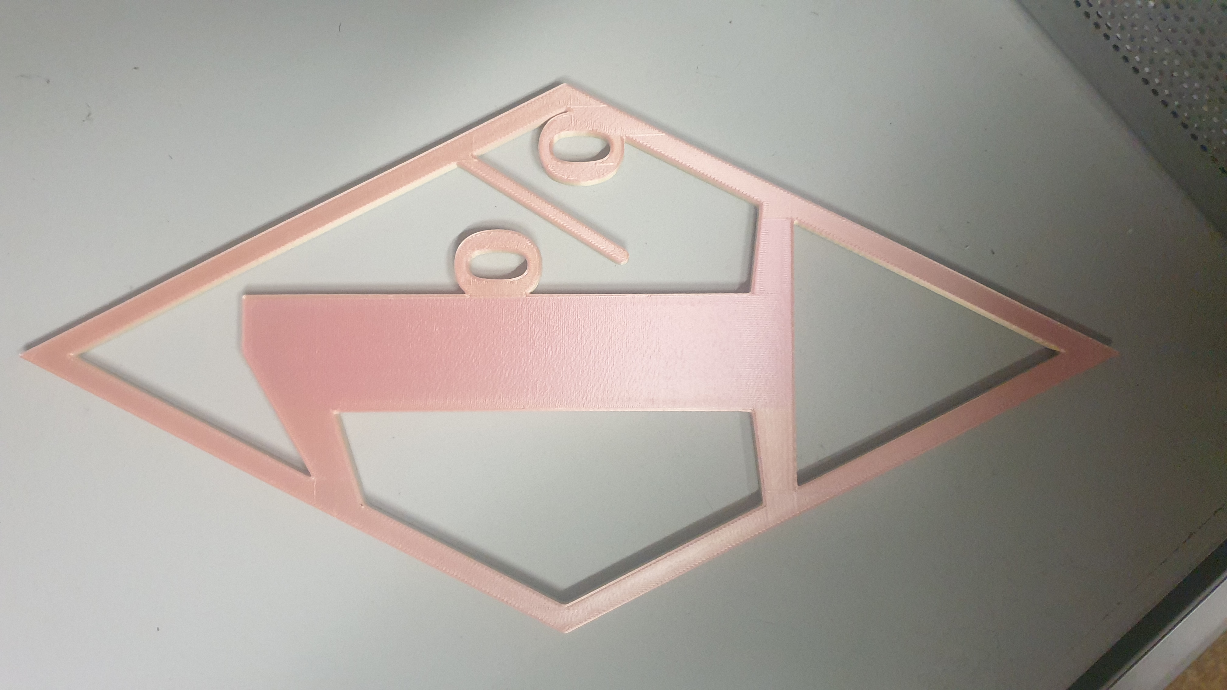 1% in a hollow diamondshape touching frame