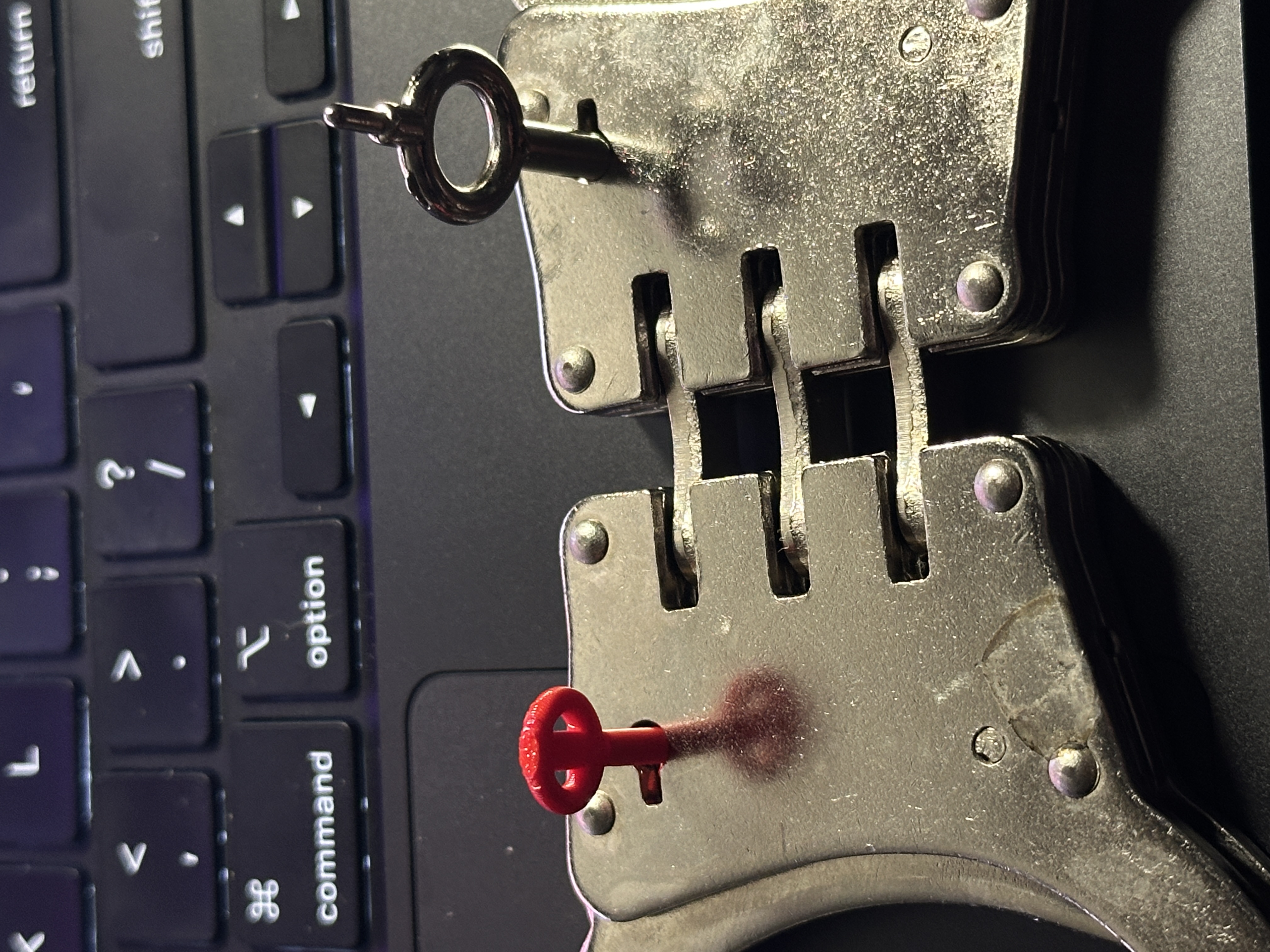 Handcuff key