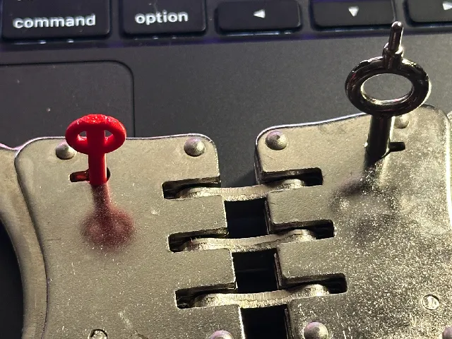 Handcuff key