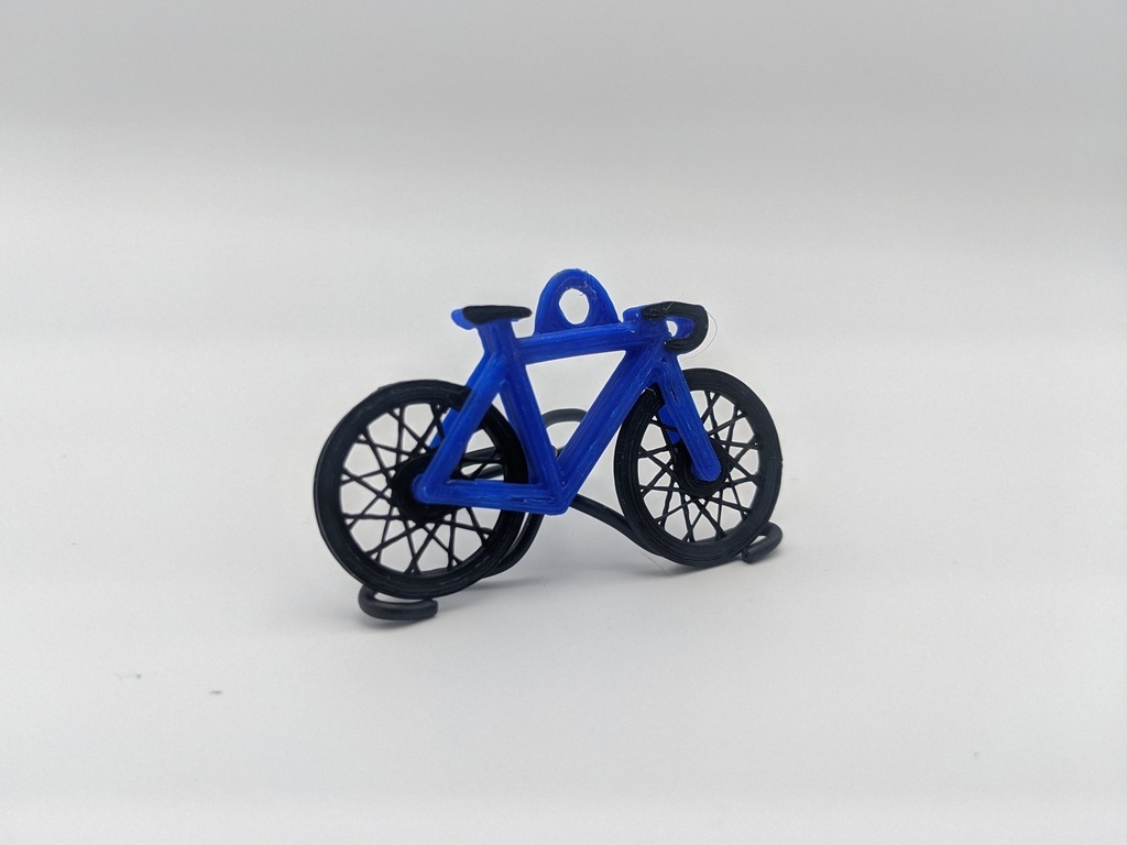 Spinning Wheel Bike Keychain by MucusLaser Download free STL model