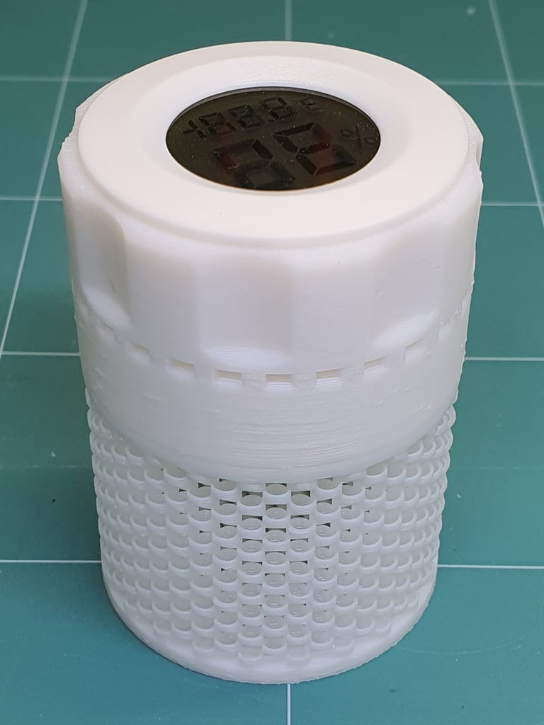 In-spool dessicant container with hygrometer - stronger weave, vented lid