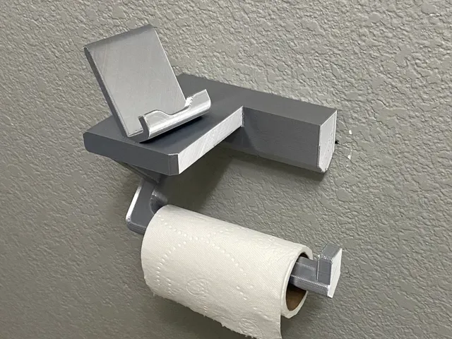 Toliet Paper Roll holder with phone stand.