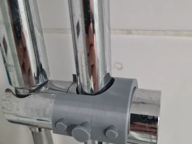 Parametric mirror attachment to shower bar