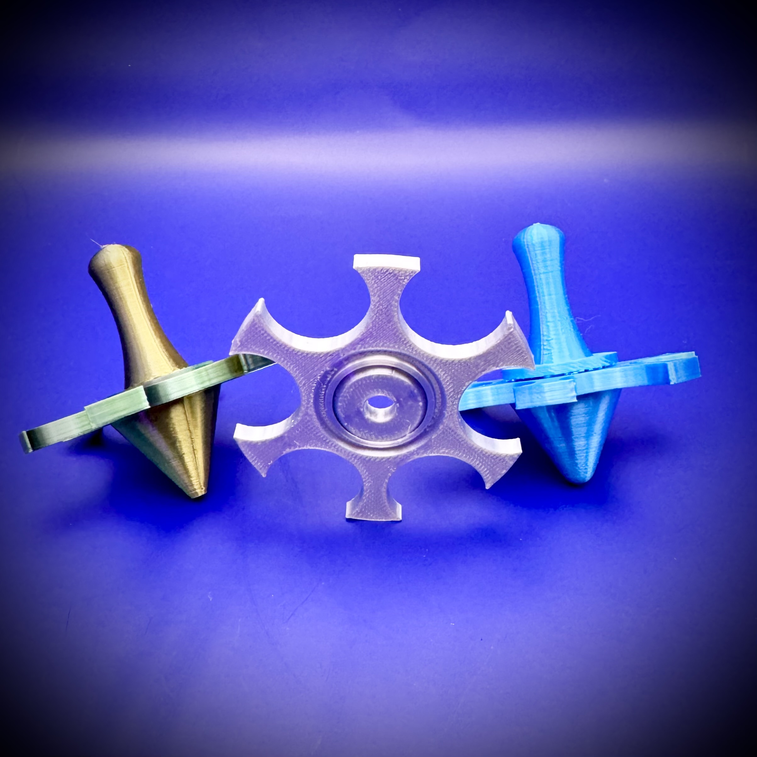 Fidget spinner with optional spinning top kit