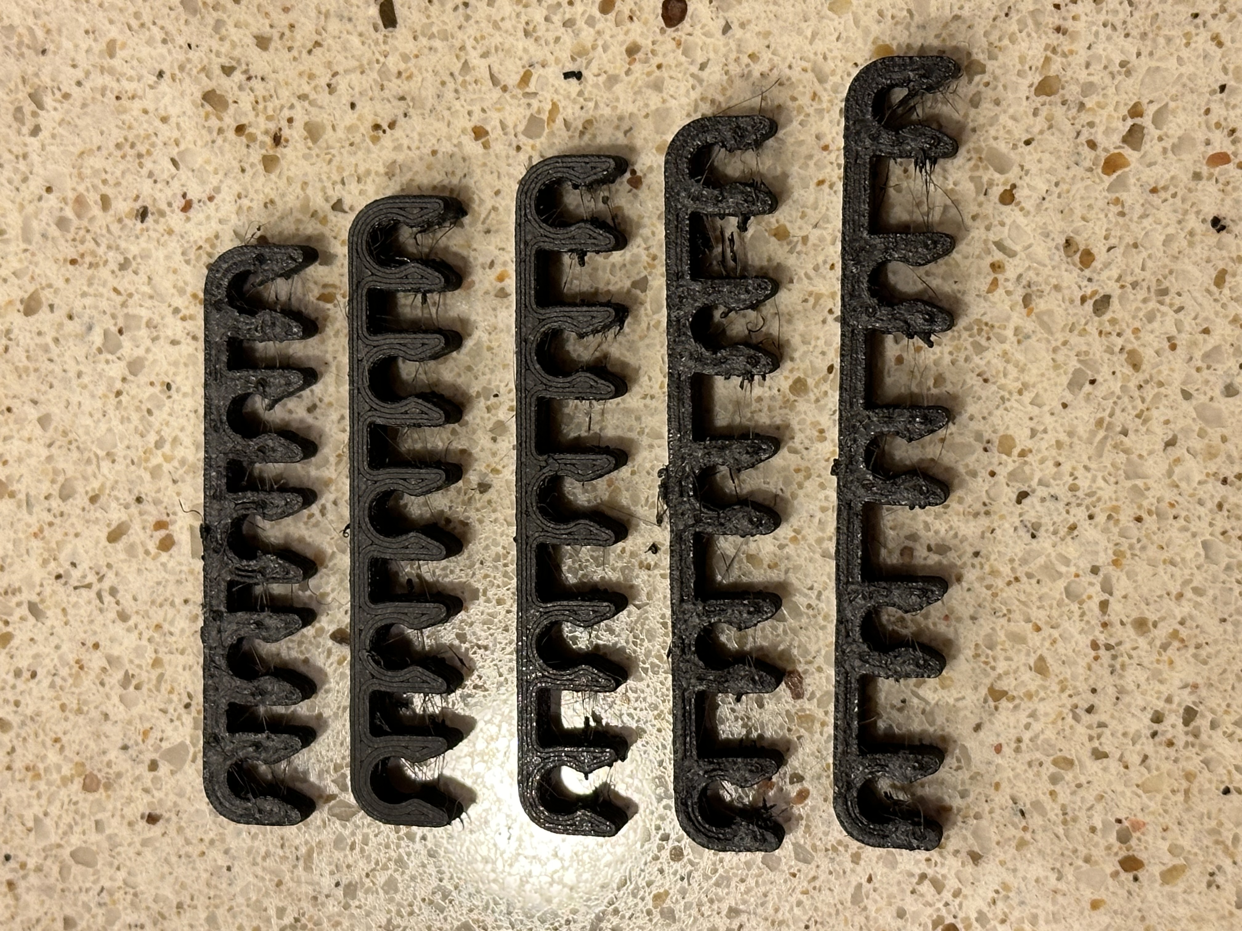 PTFE clips R4. 10mm to 15mm on center.