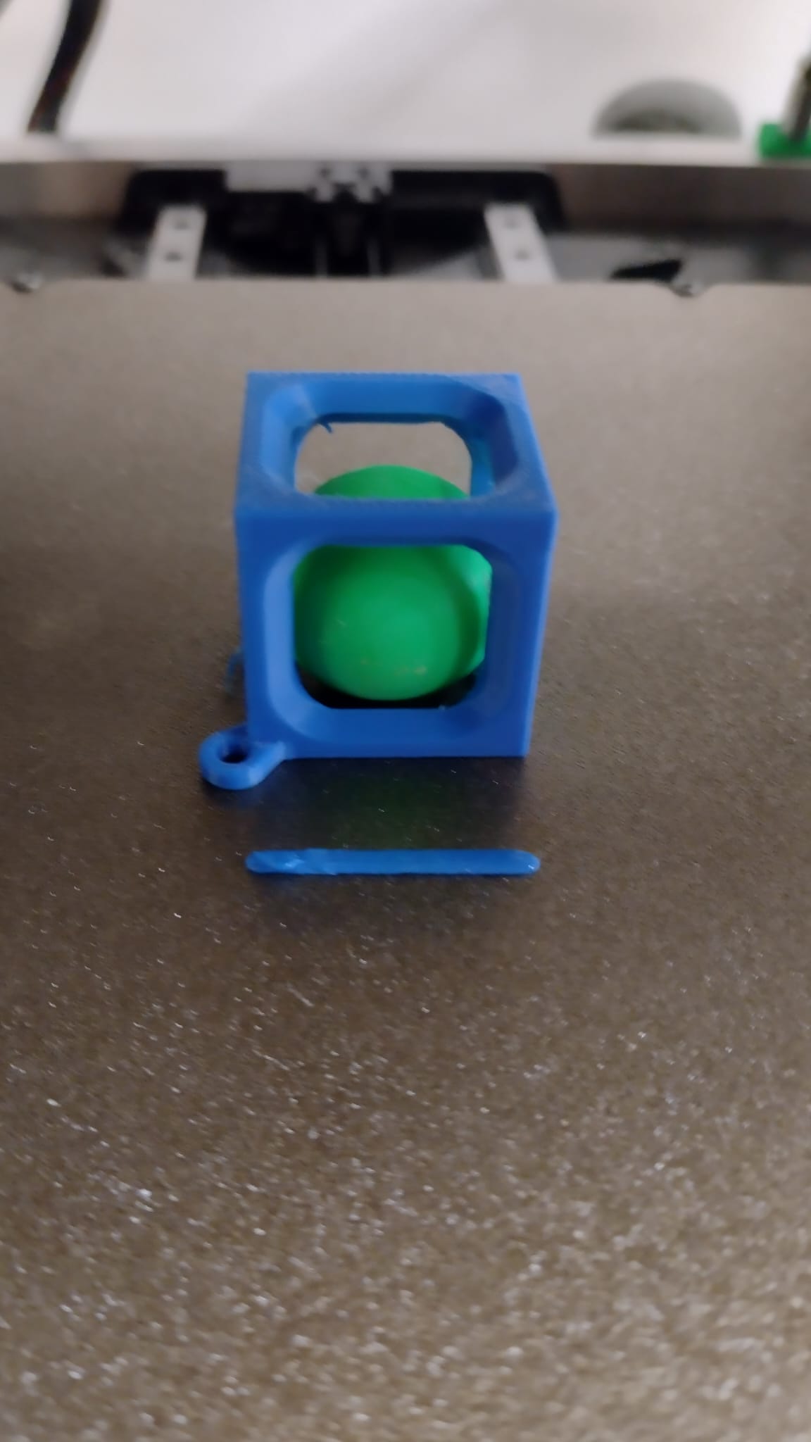 Impossible ball in cage