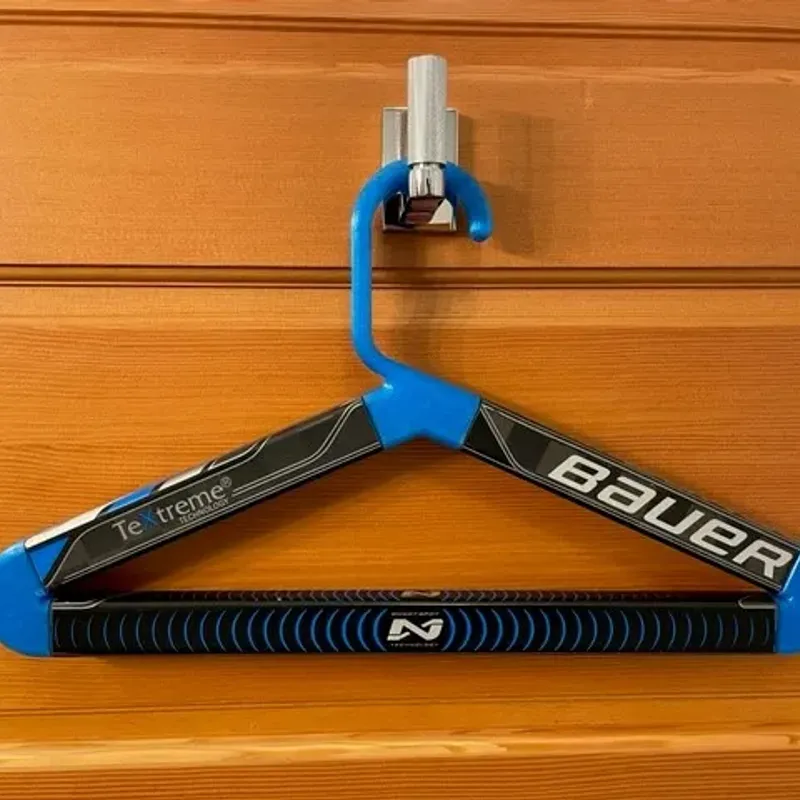 Designed and 3D printed my own wall mounts for my hockey gear so I