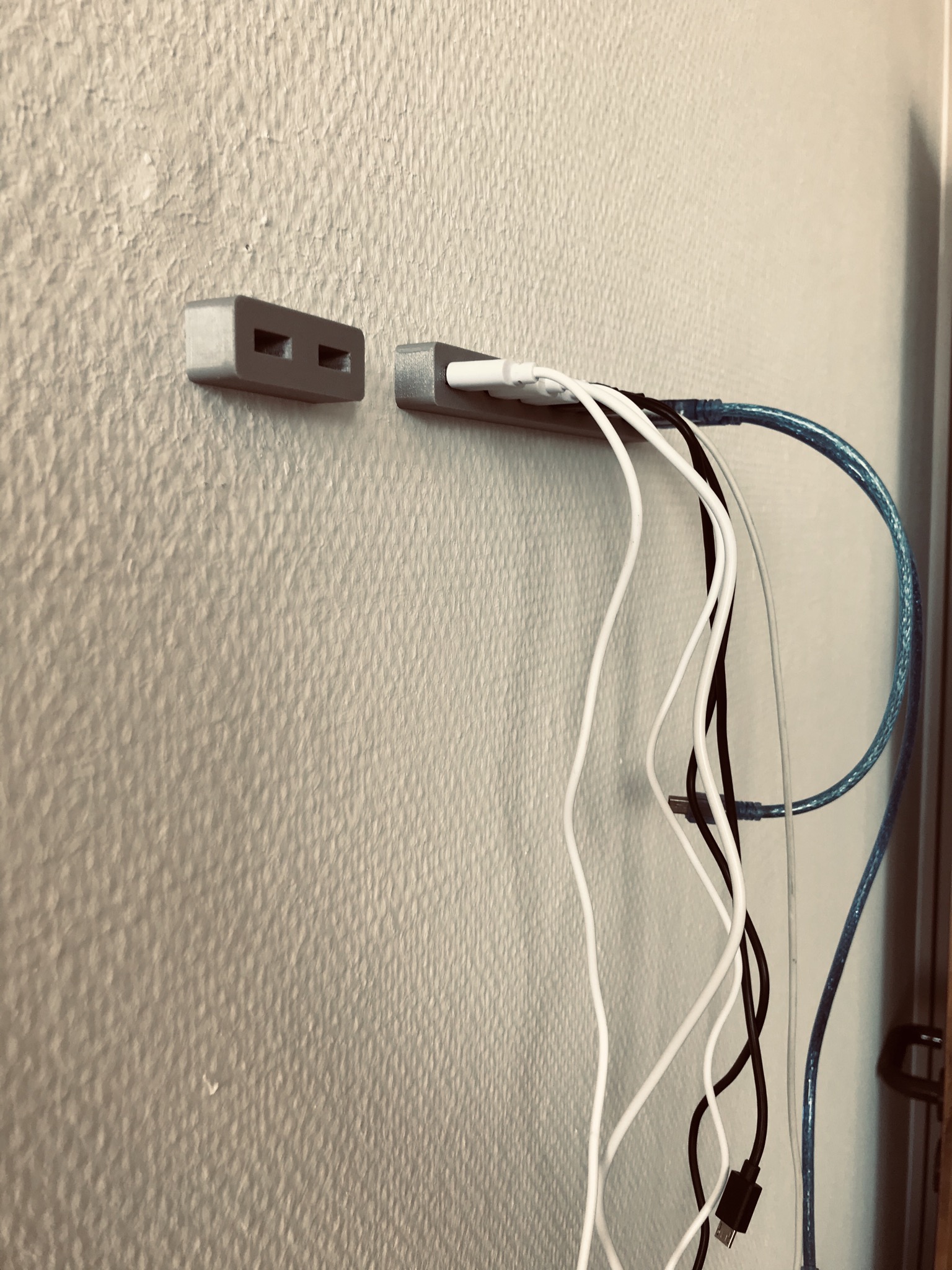 OpenSCAD USB cable storage for wall mount