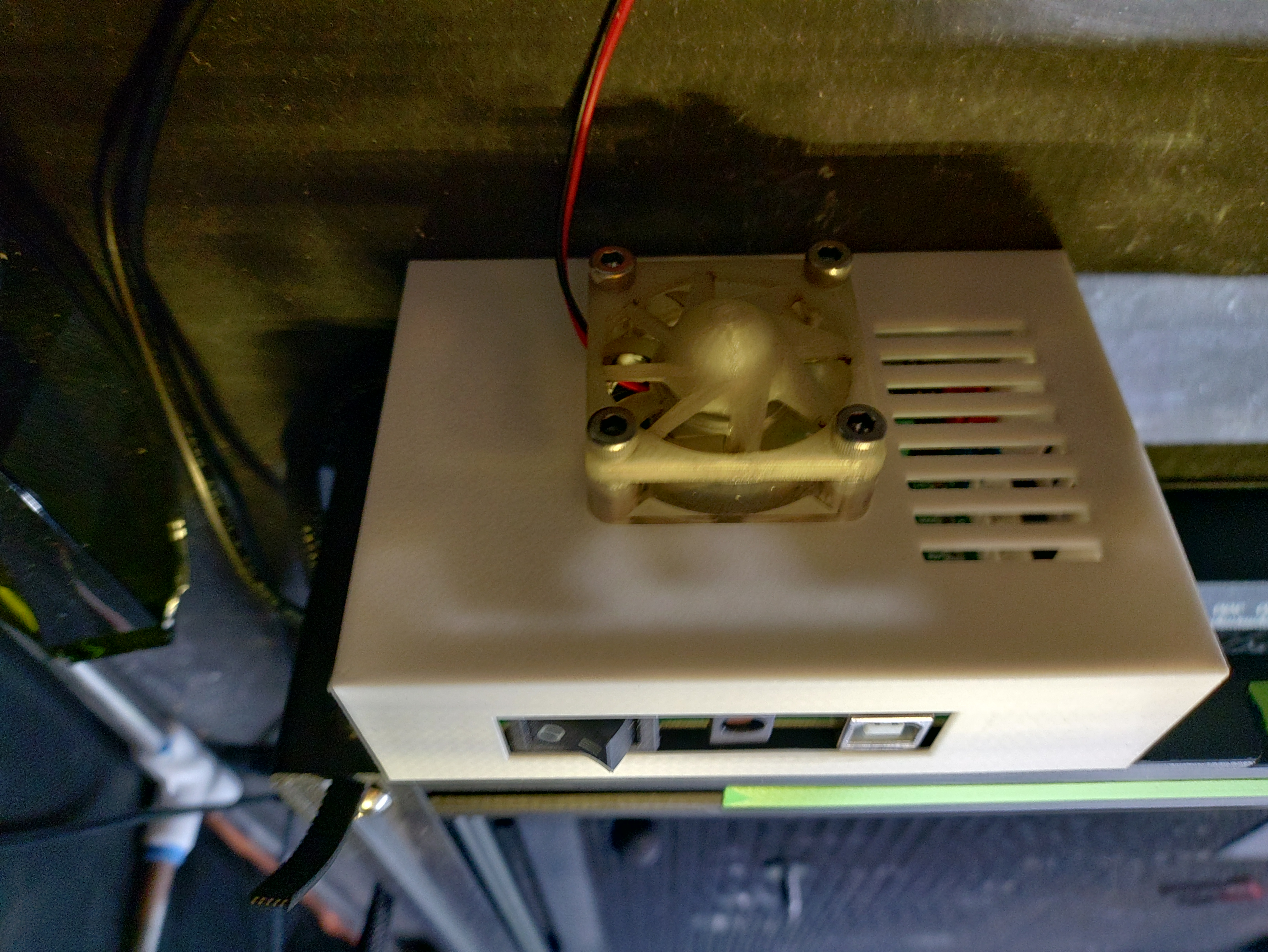 Laser engraver electronics cover with fan mount
