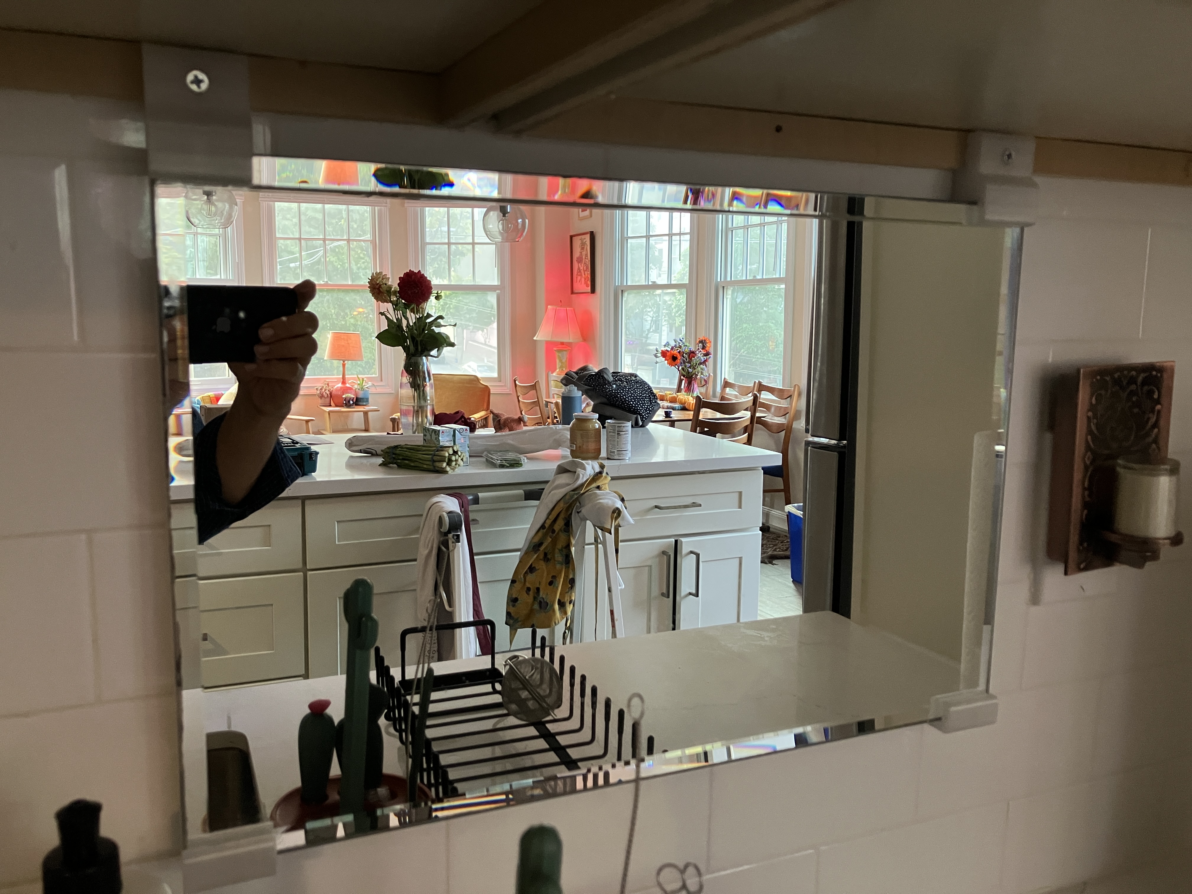 Mirror mount on kitchen tile backsplash