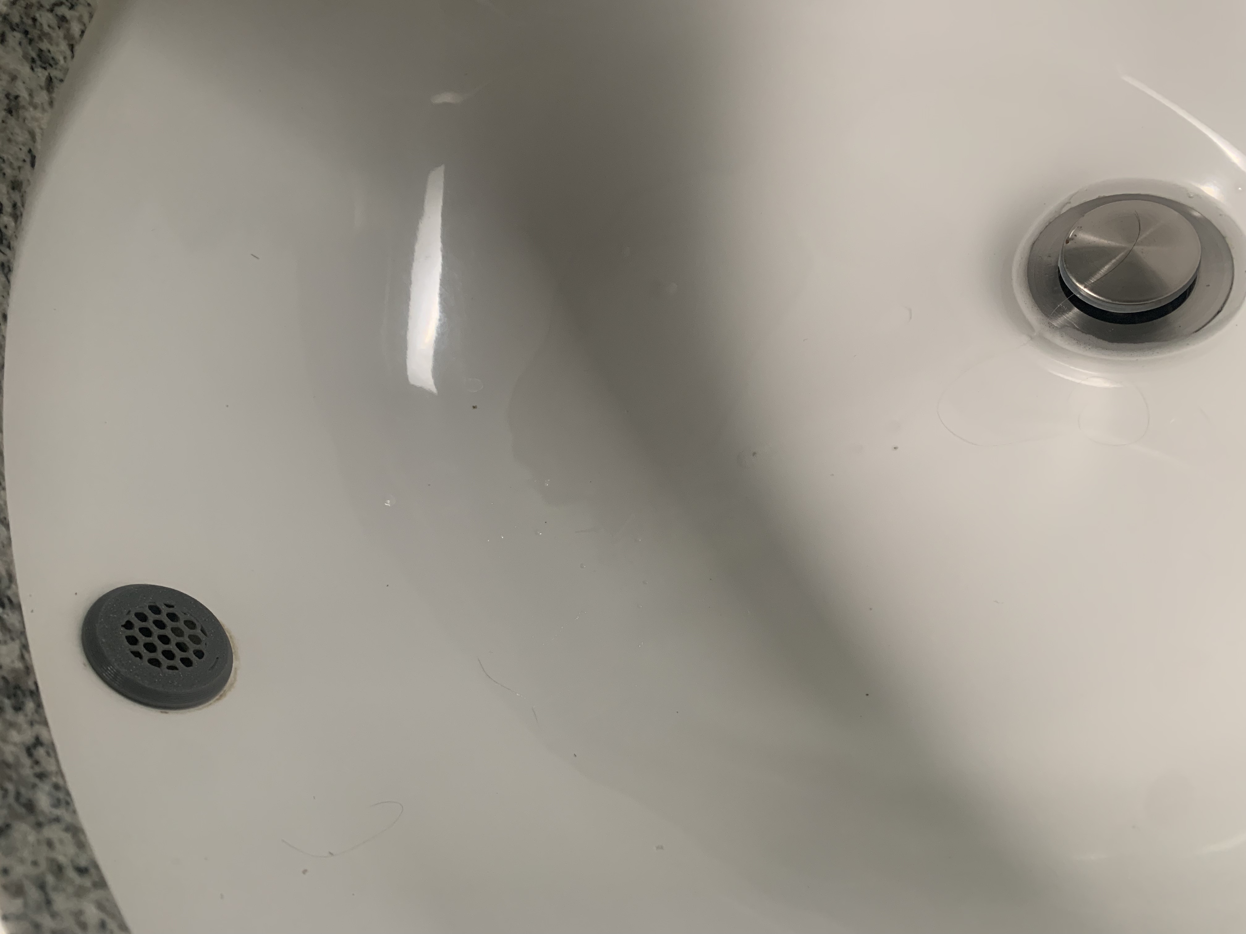 Bathroom sink overflow plug