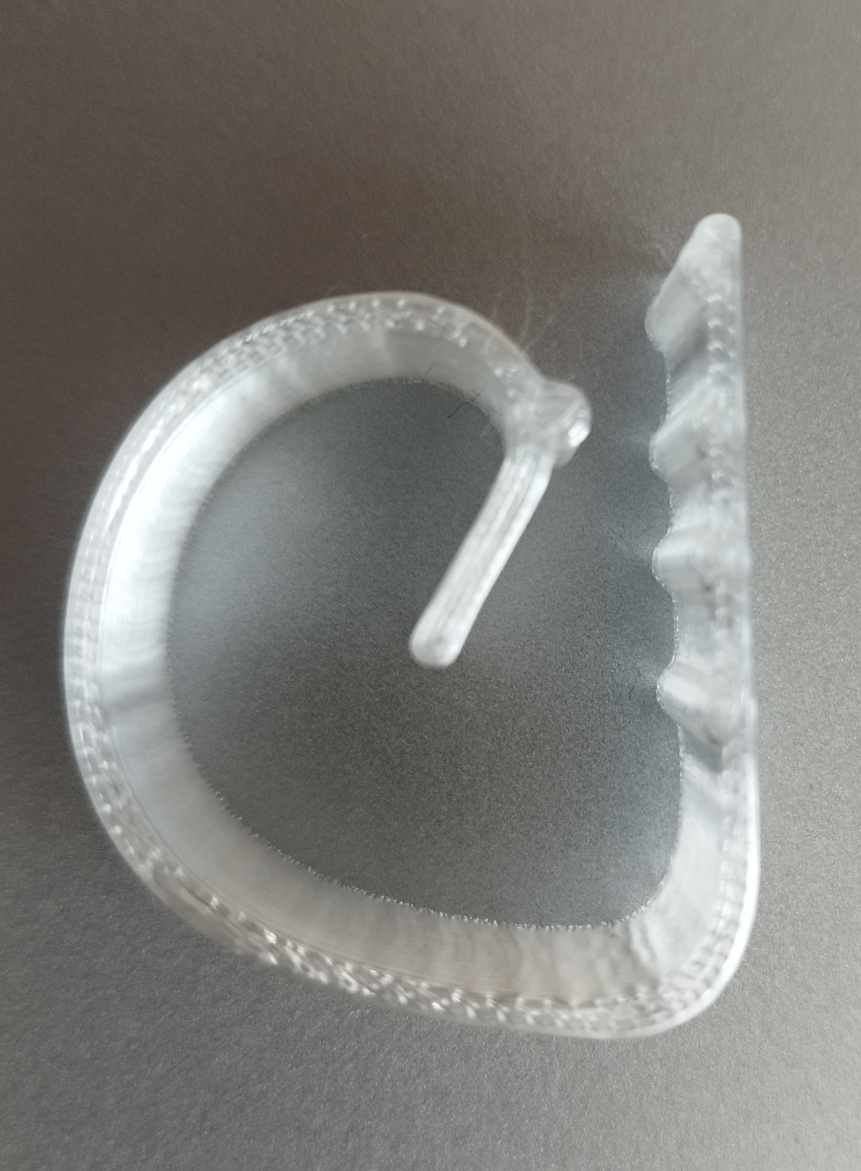 Tablecloth clip for the glass table