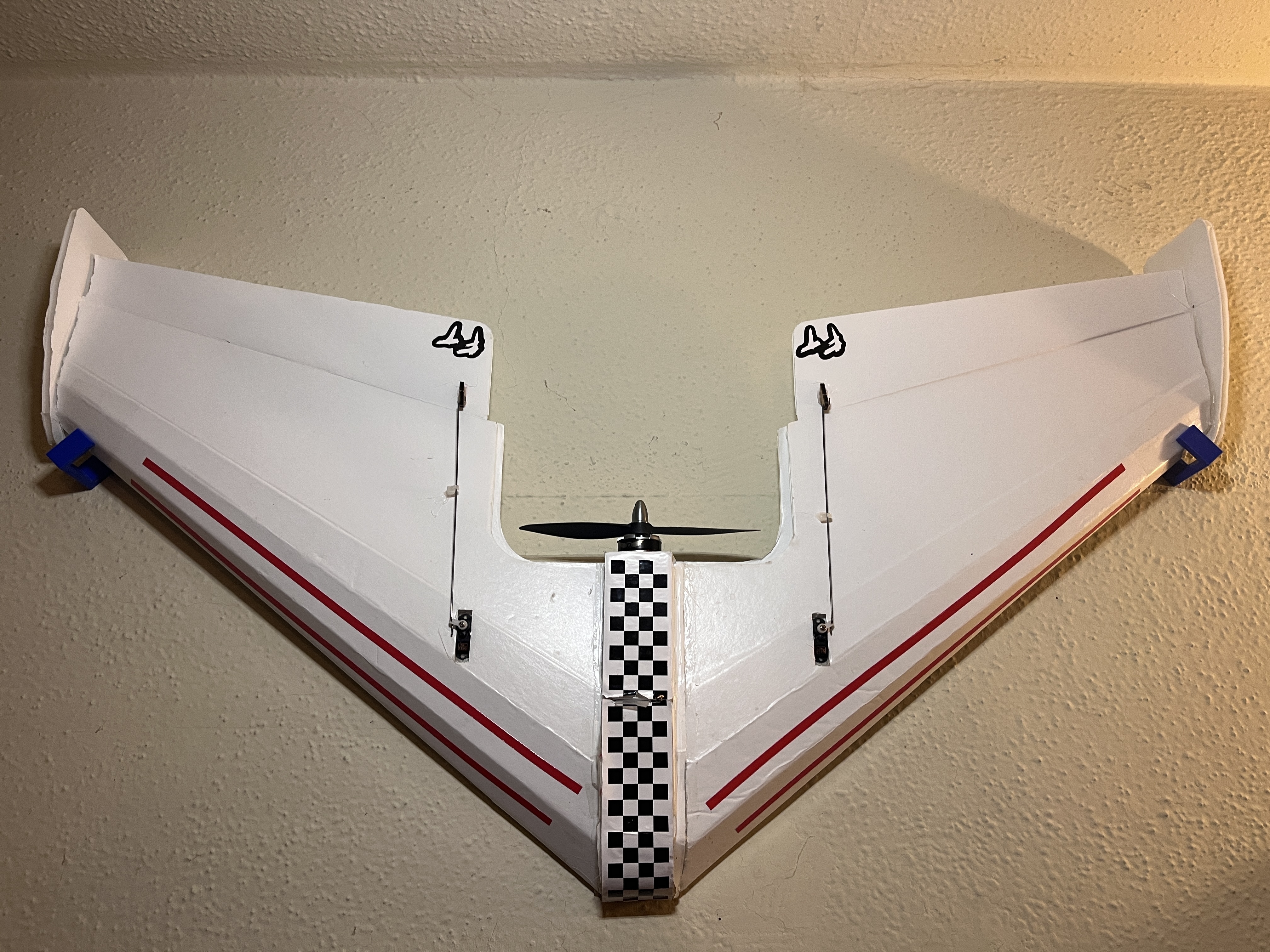 Wall mount hooks for RC delta wing (including Flite Test Mini Arrow)