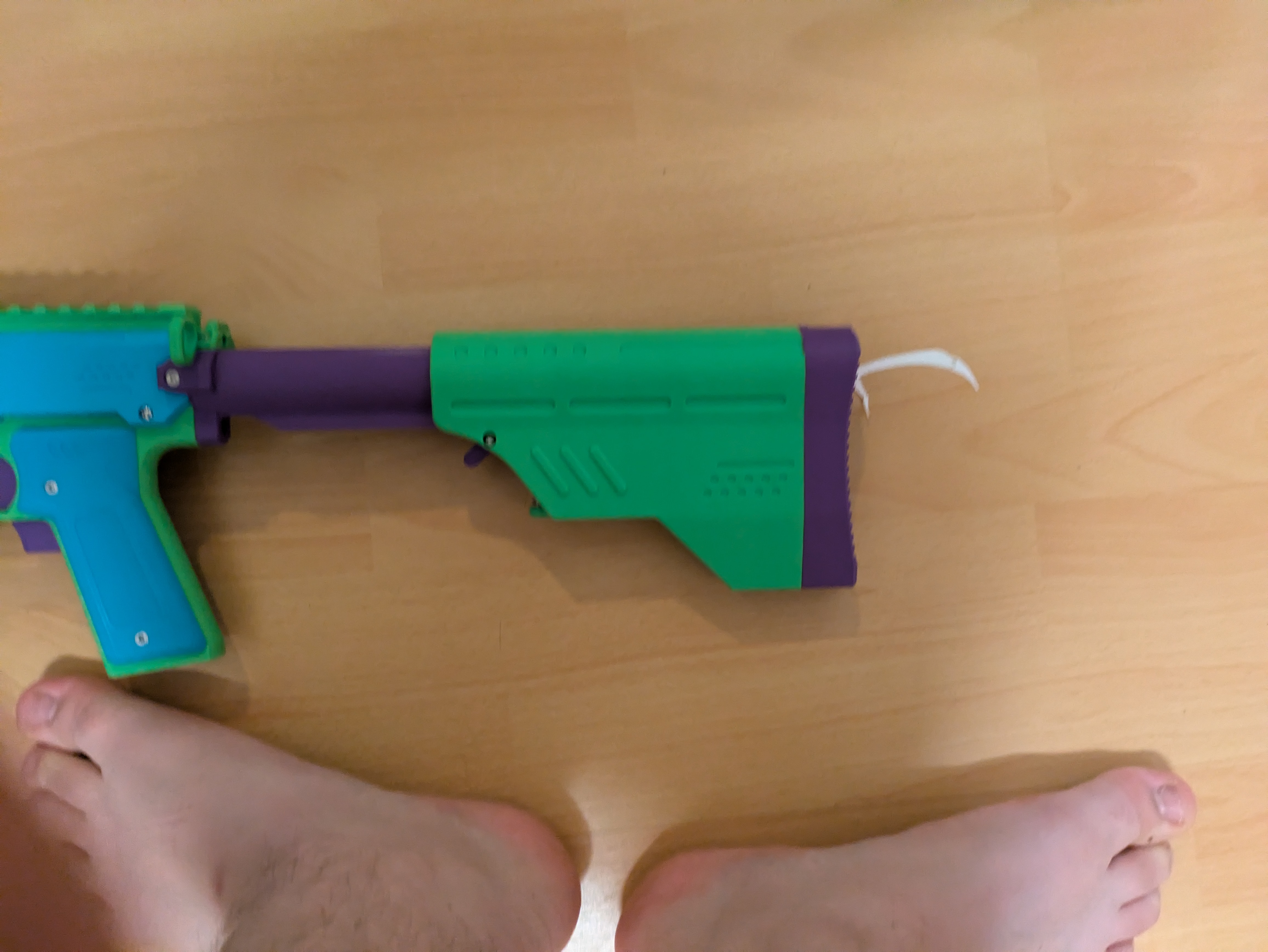 the Gryphon blaster expanded buffer tube stock buttplate.