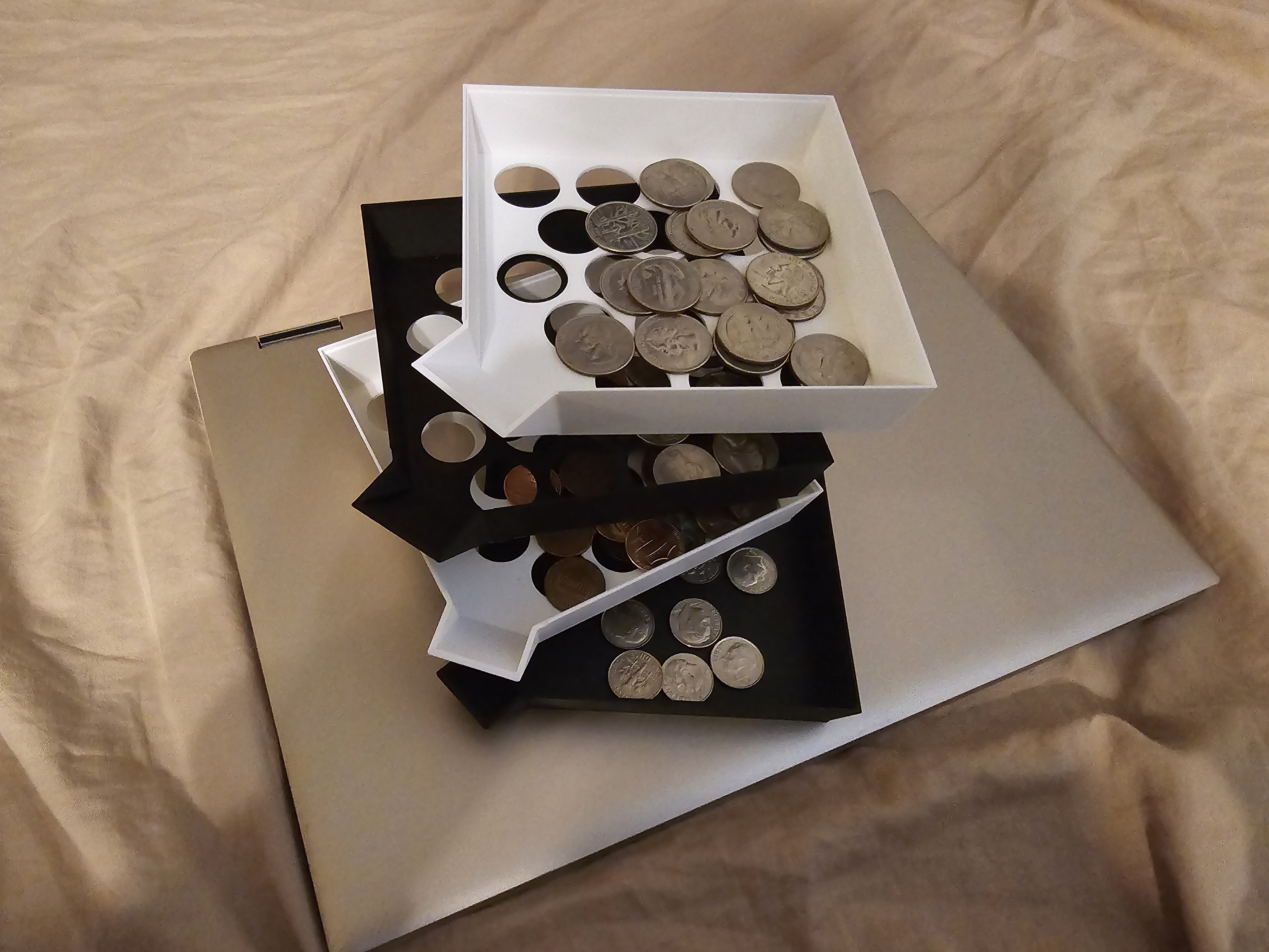 Nesting stacking coin sorting trays