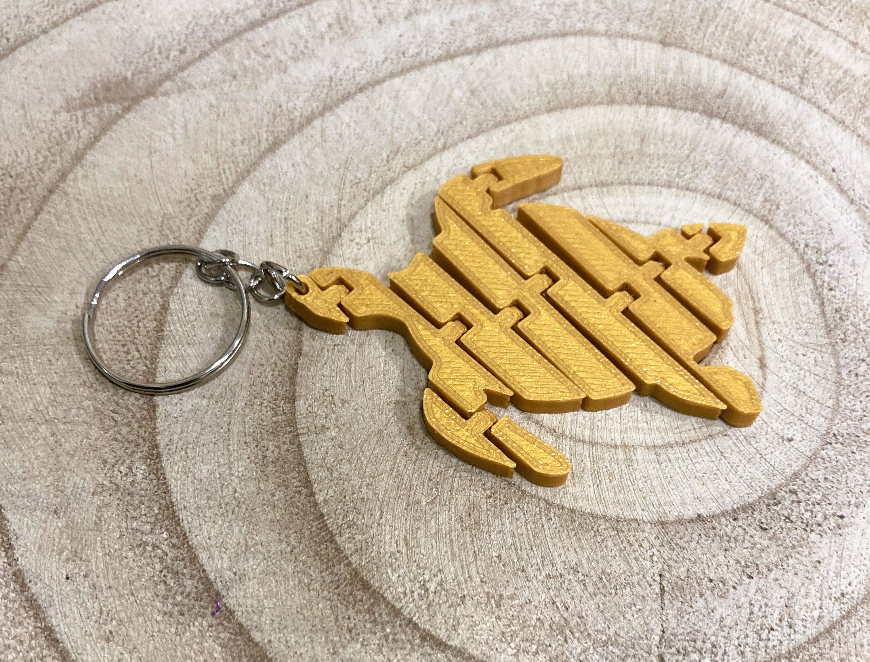Articulated turtle keychain