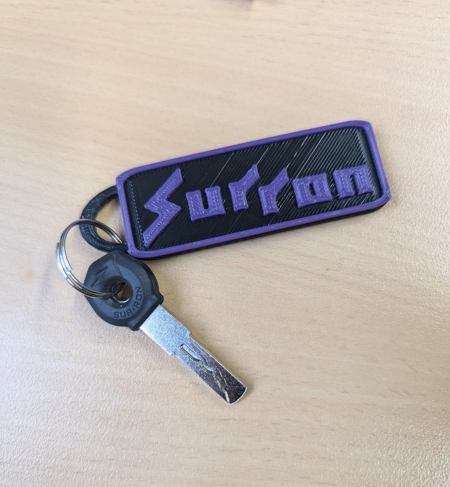 Surron Logo Keychain