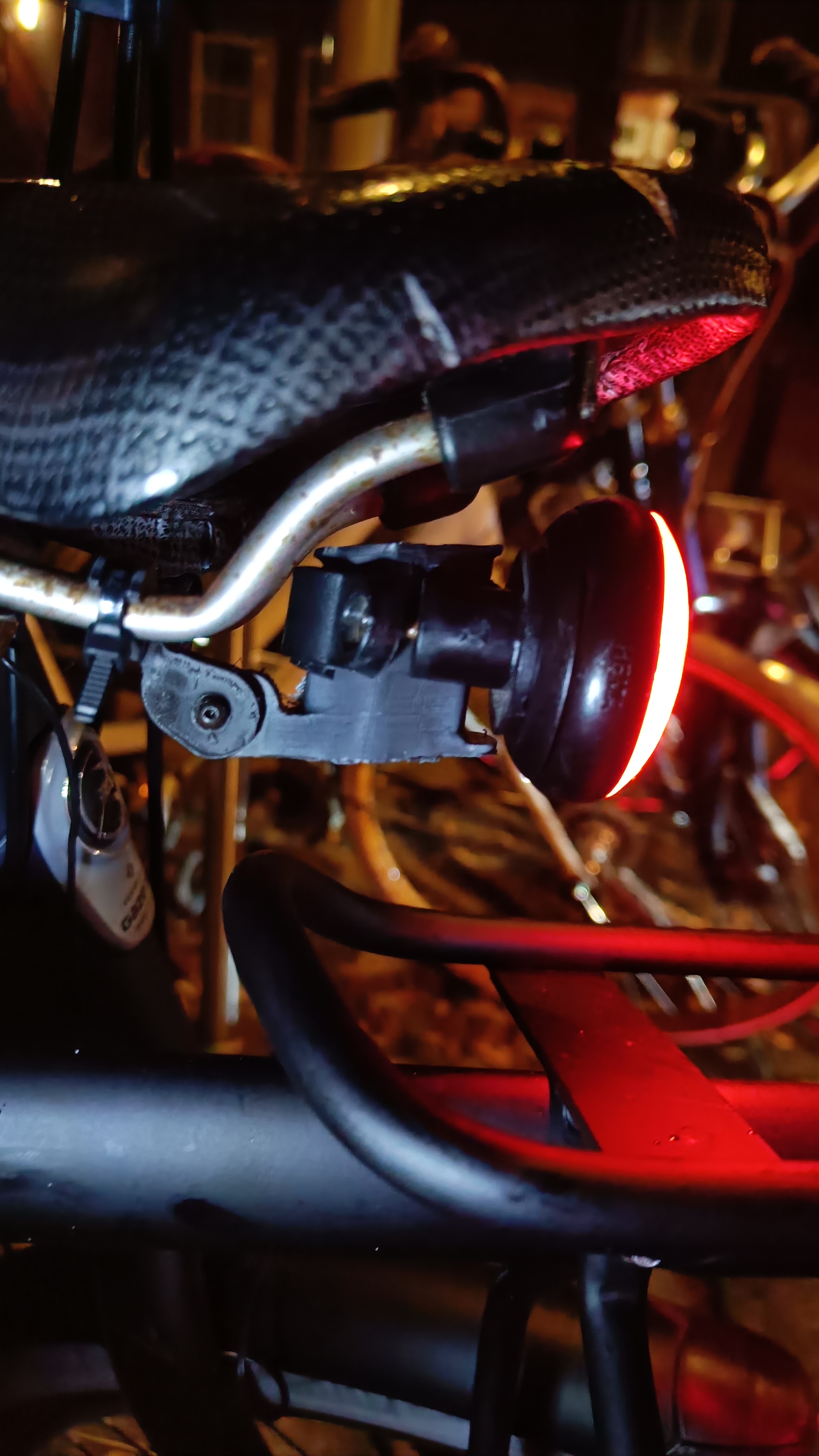 Rounder bike light holder saddle mount