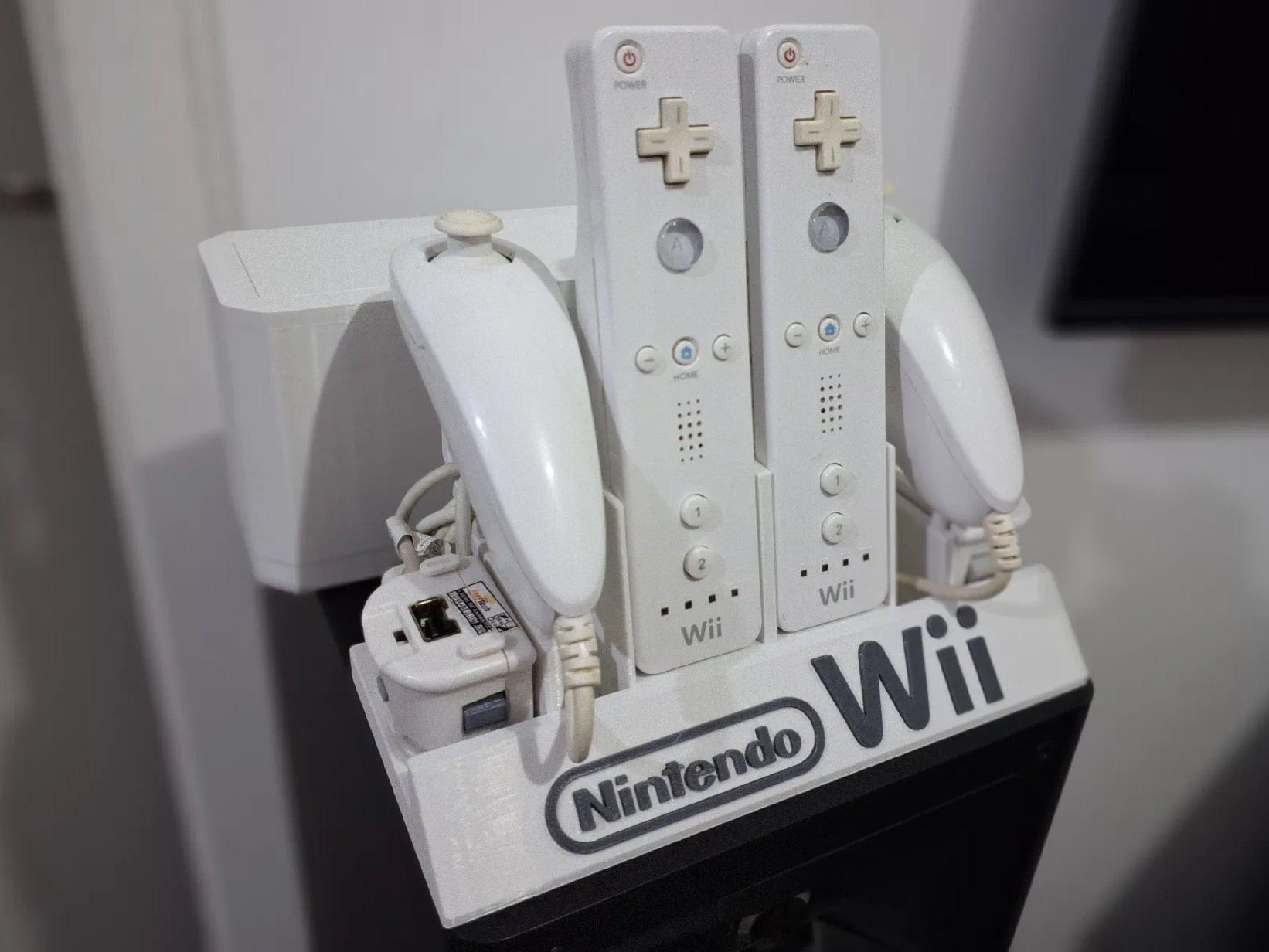 Nintendo Wii Controller Stand with enclosure for the Wiimote sleeves 3D model thumbnail