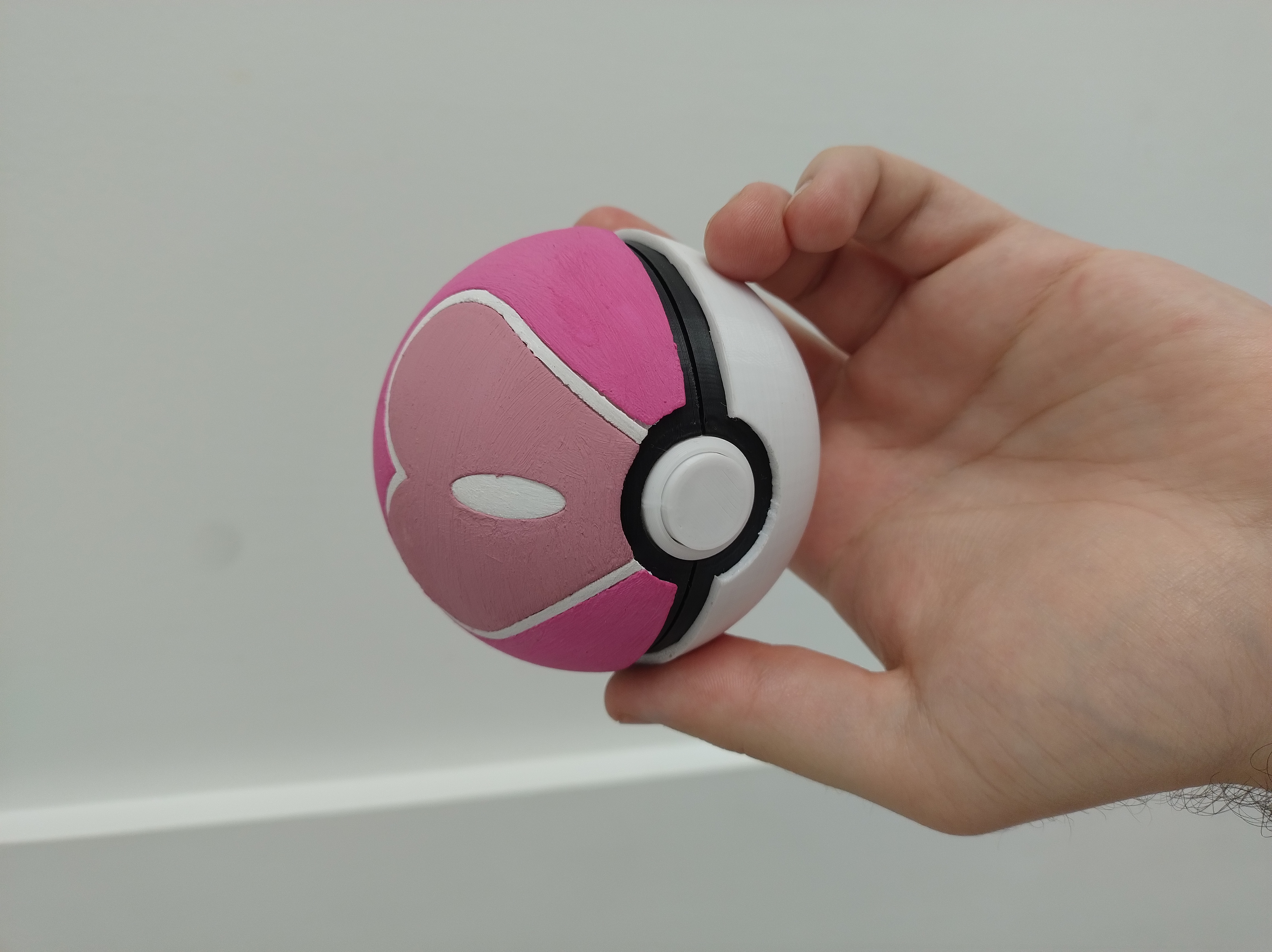 Loveball with hinge (V1.6), functional button and insert for GBA, DS and 3DS cartridges 3D model