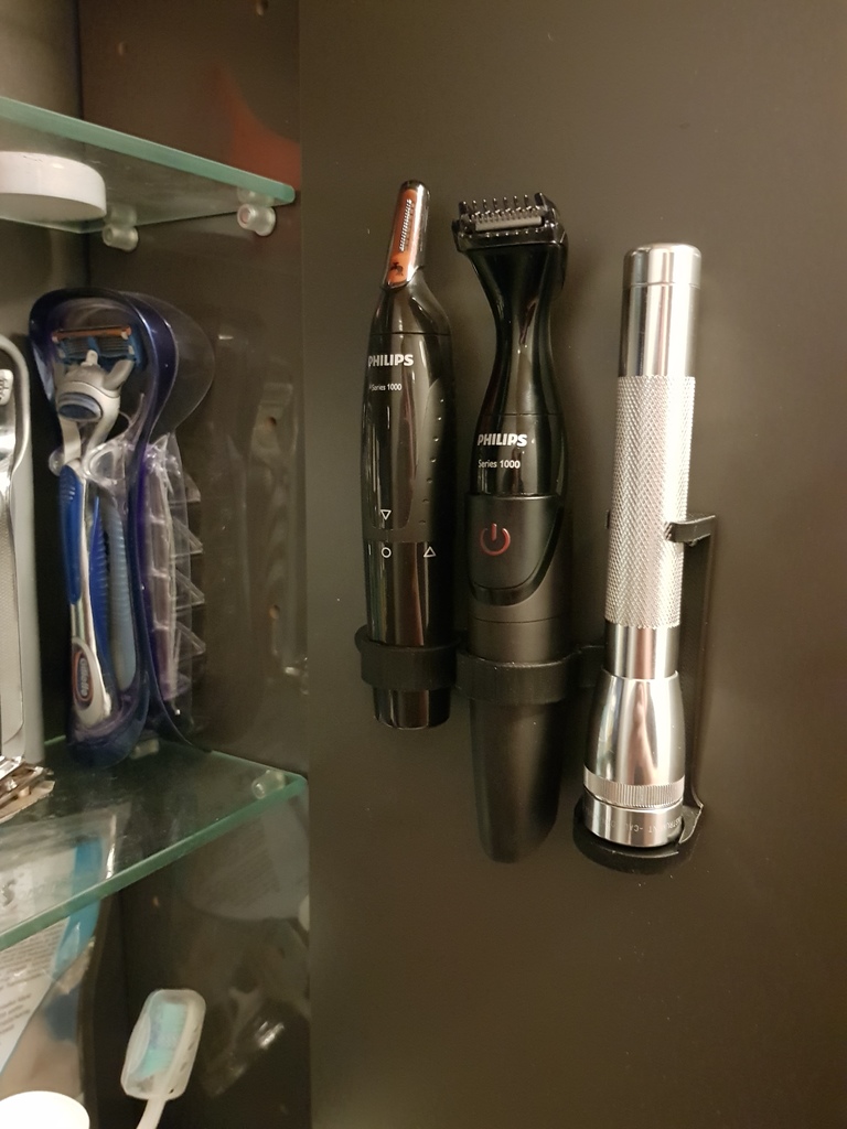 Holder for Philips beard trimmers and a Maglite Mini