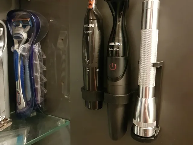 Holder for Philips beard trimmers and a Maglite Mini
