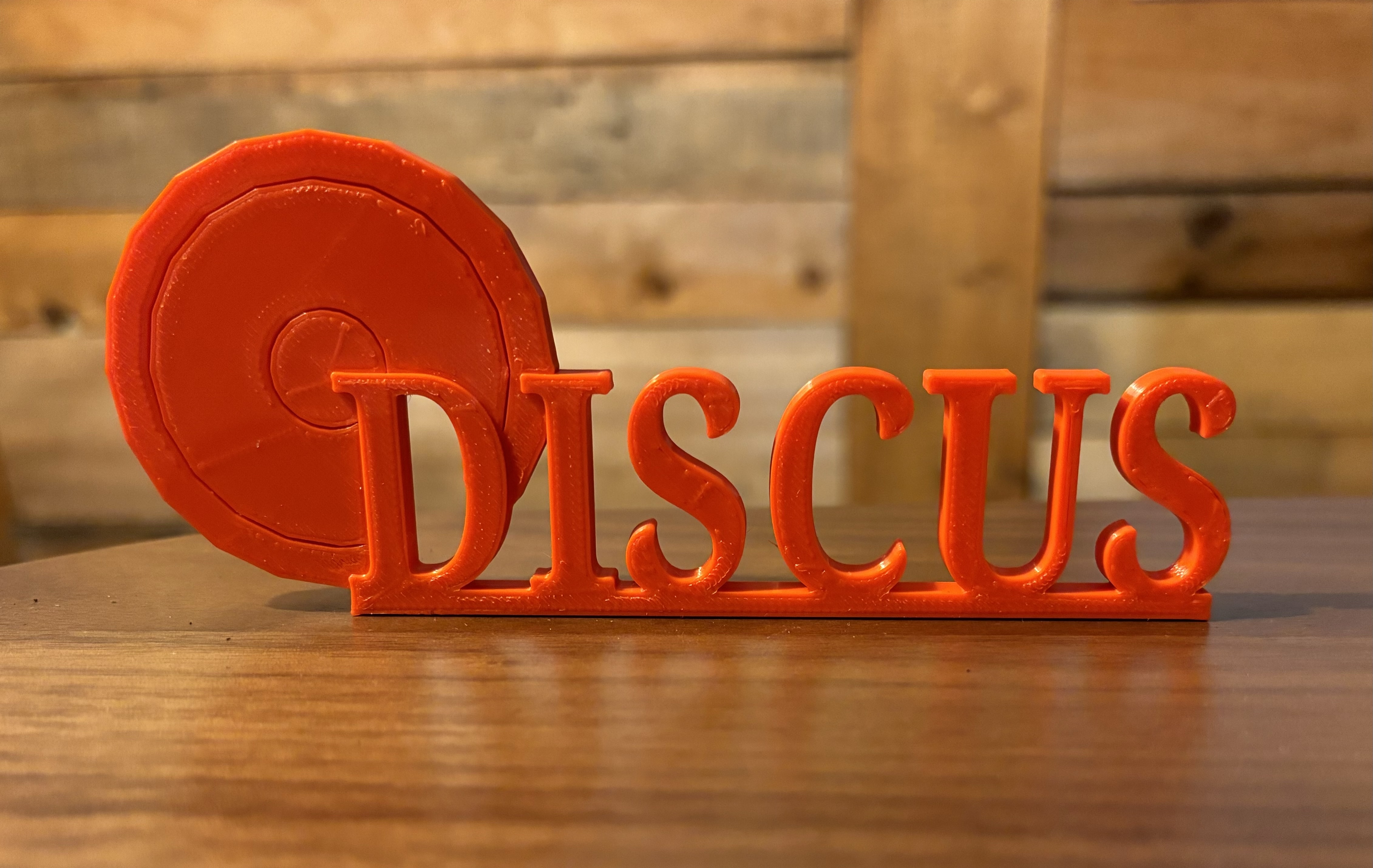 Discus name plate