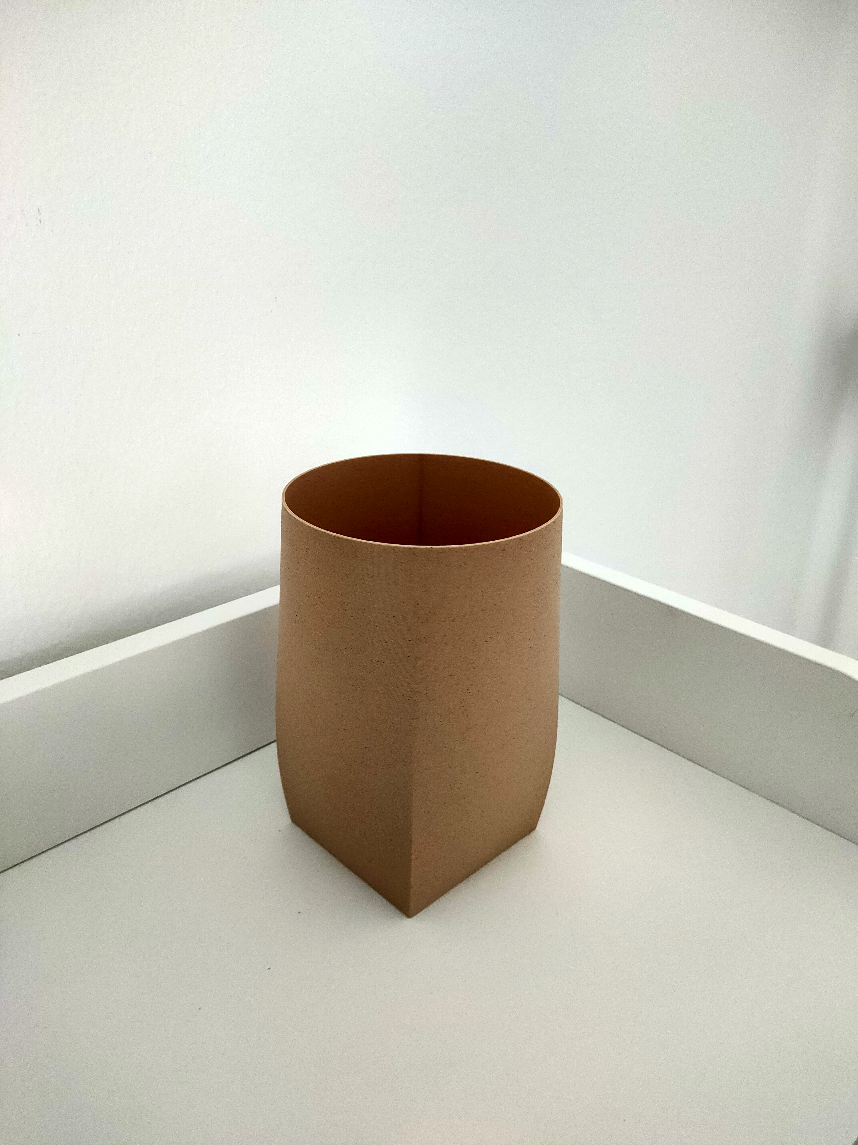 Square into circle planter